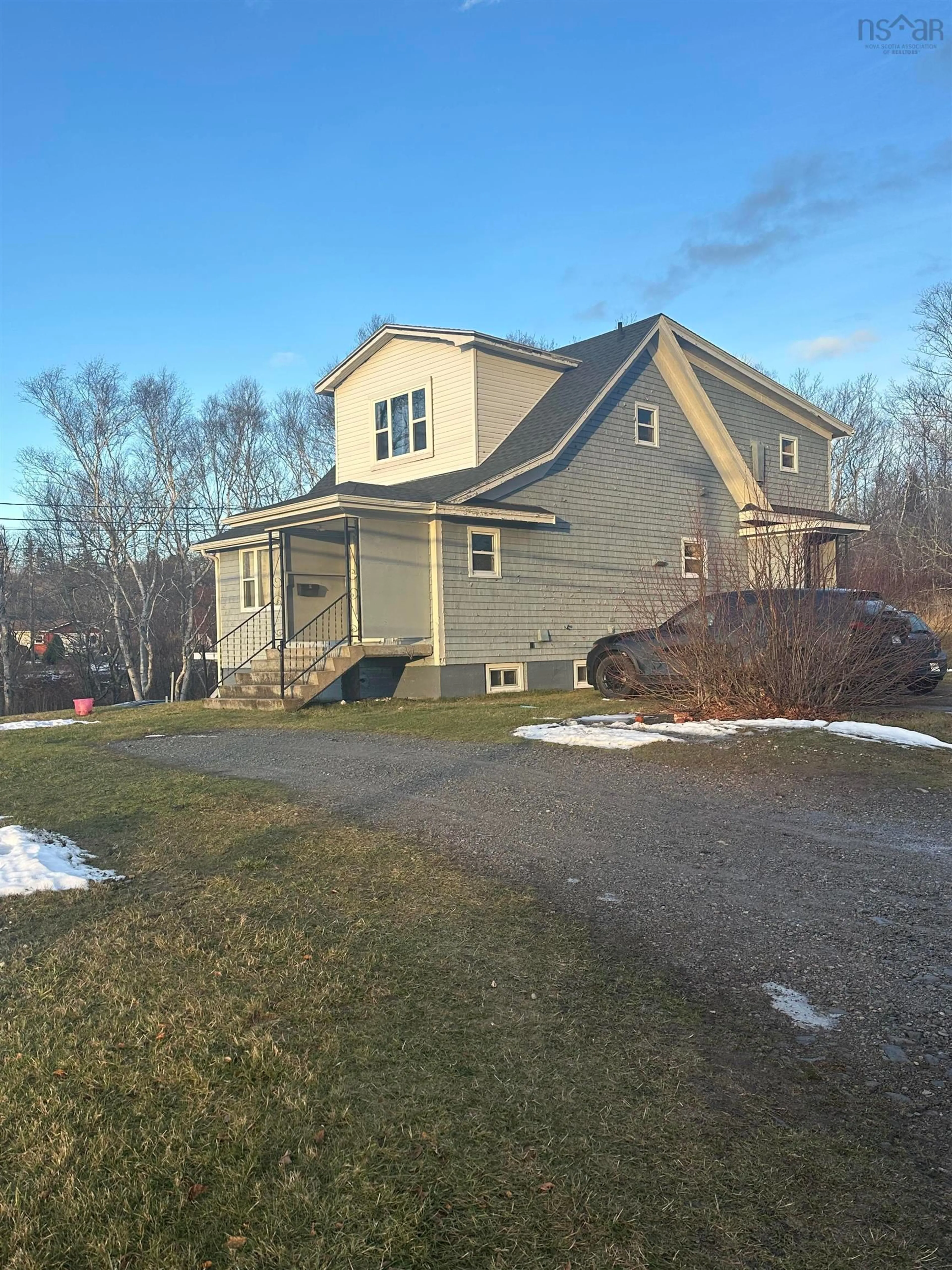 A pic from outside/outdoor area/front of a property/back of a property/a pic from drone, street for 1696 Victoria Rd, Sydney Nova Scotia B1N 1N3