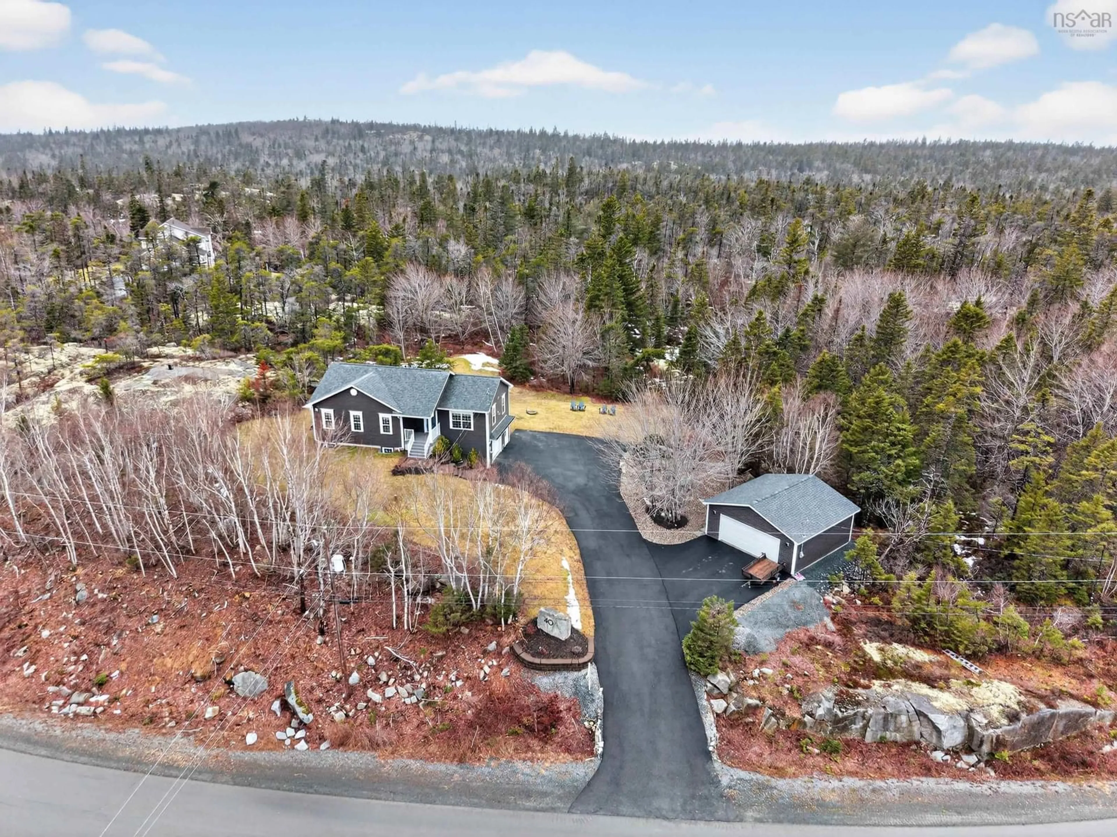 A pic from outside/outdoor area/front of a property/back of a property/a pic from drone, forest/trees view for 40 Sutherland Dr Dr, Fall River Nova Scotia B2T 1M1