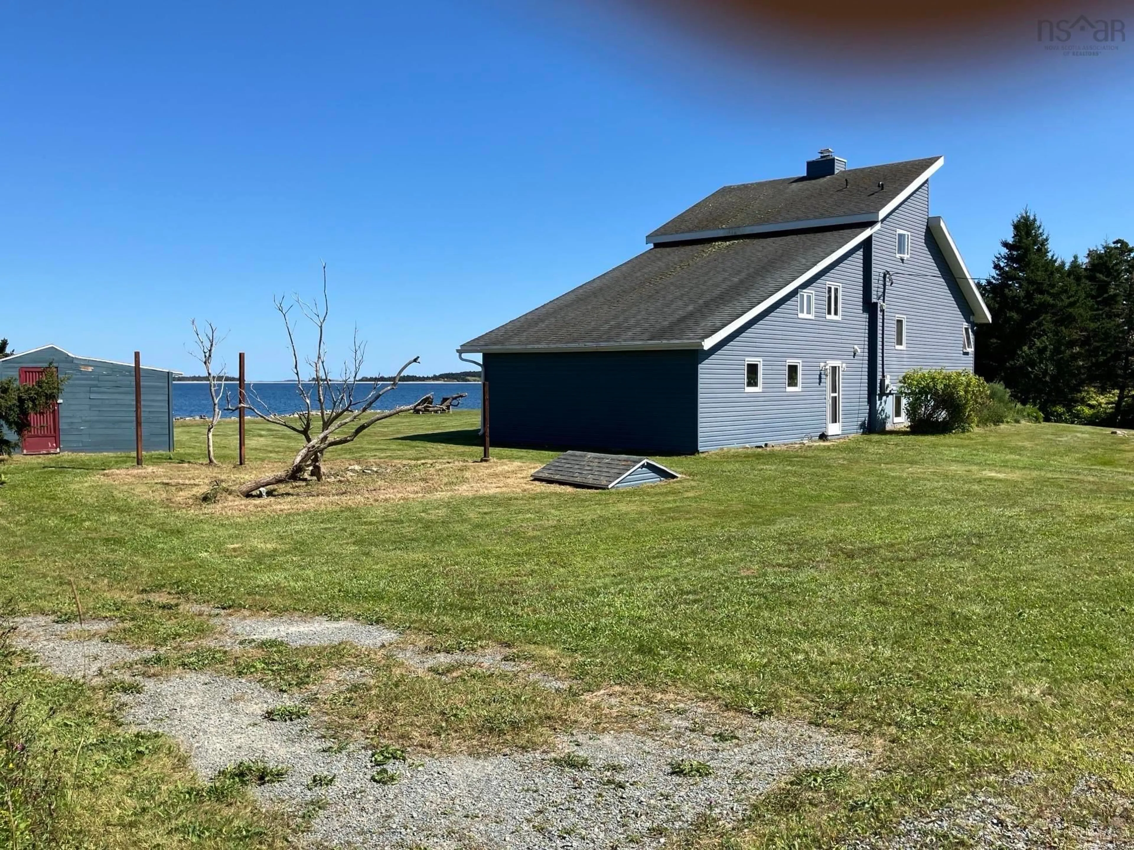 A pic from outside/outdoor area/front of a property/back of a property/a pic from drone, water/lake/river/ocean view for 125 Mozier Cove Rd, Sober Island Nova Scotia B0J 3B0