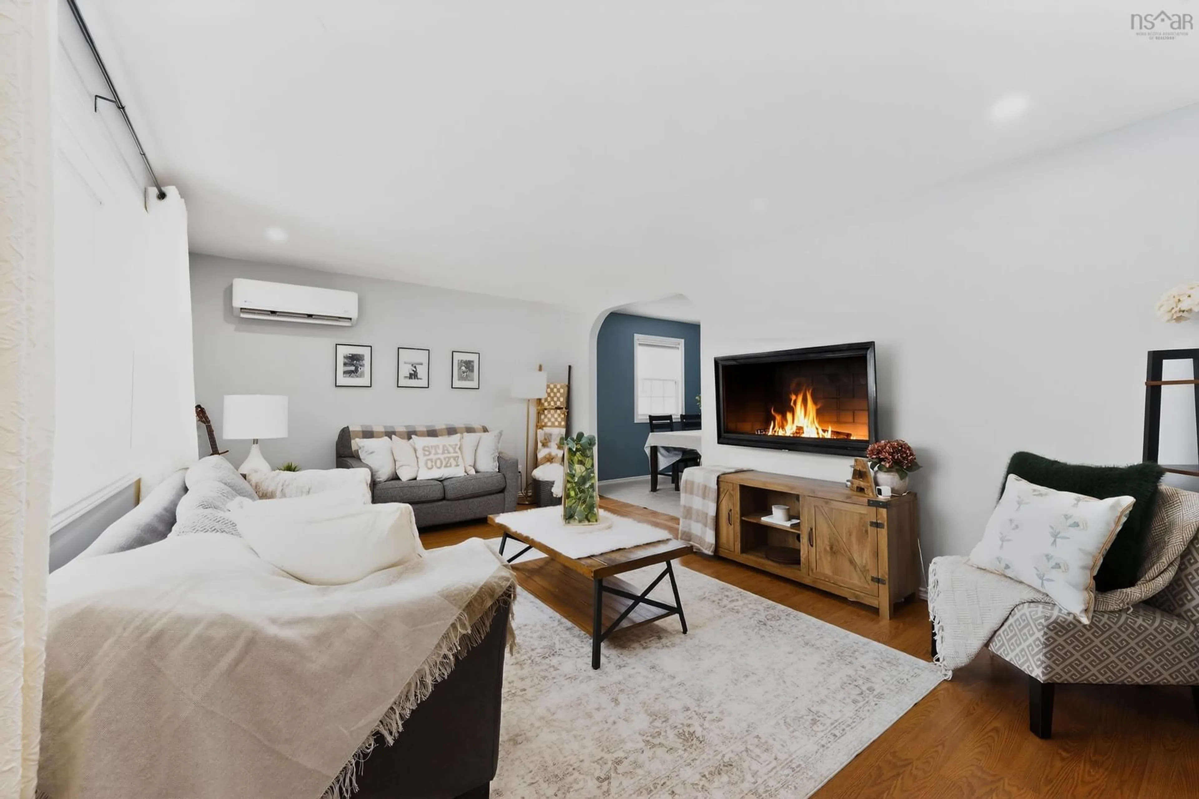 Living room with furniture, wood/laminate floor for 132 Duffell Dr, Mira Road Nova Scotia B1P 3G9