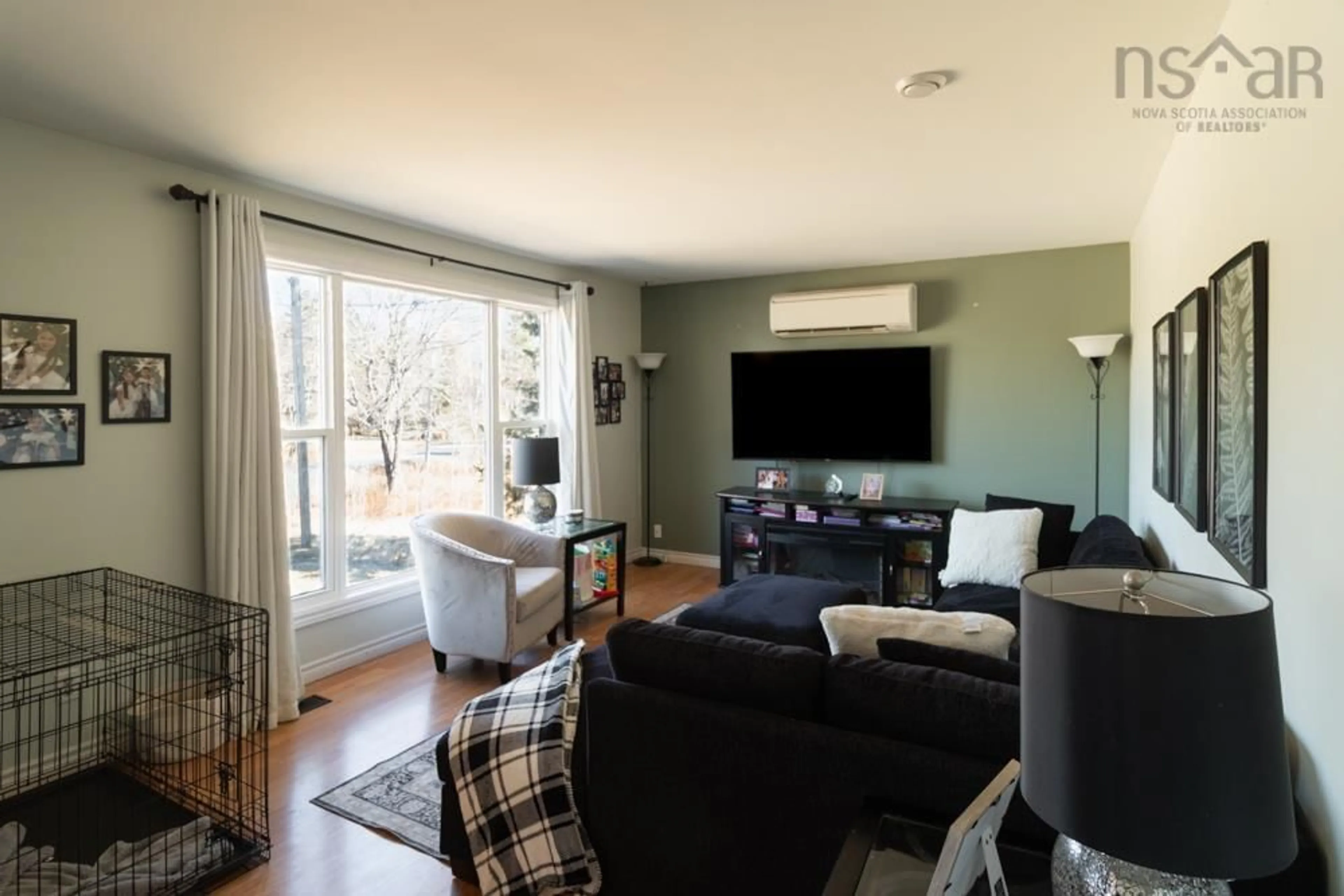 Living room with furniture, wood/laminate floor for 11 East Uniacke Rd, Mount Uniacke Nova Scotia B0N 1Z0