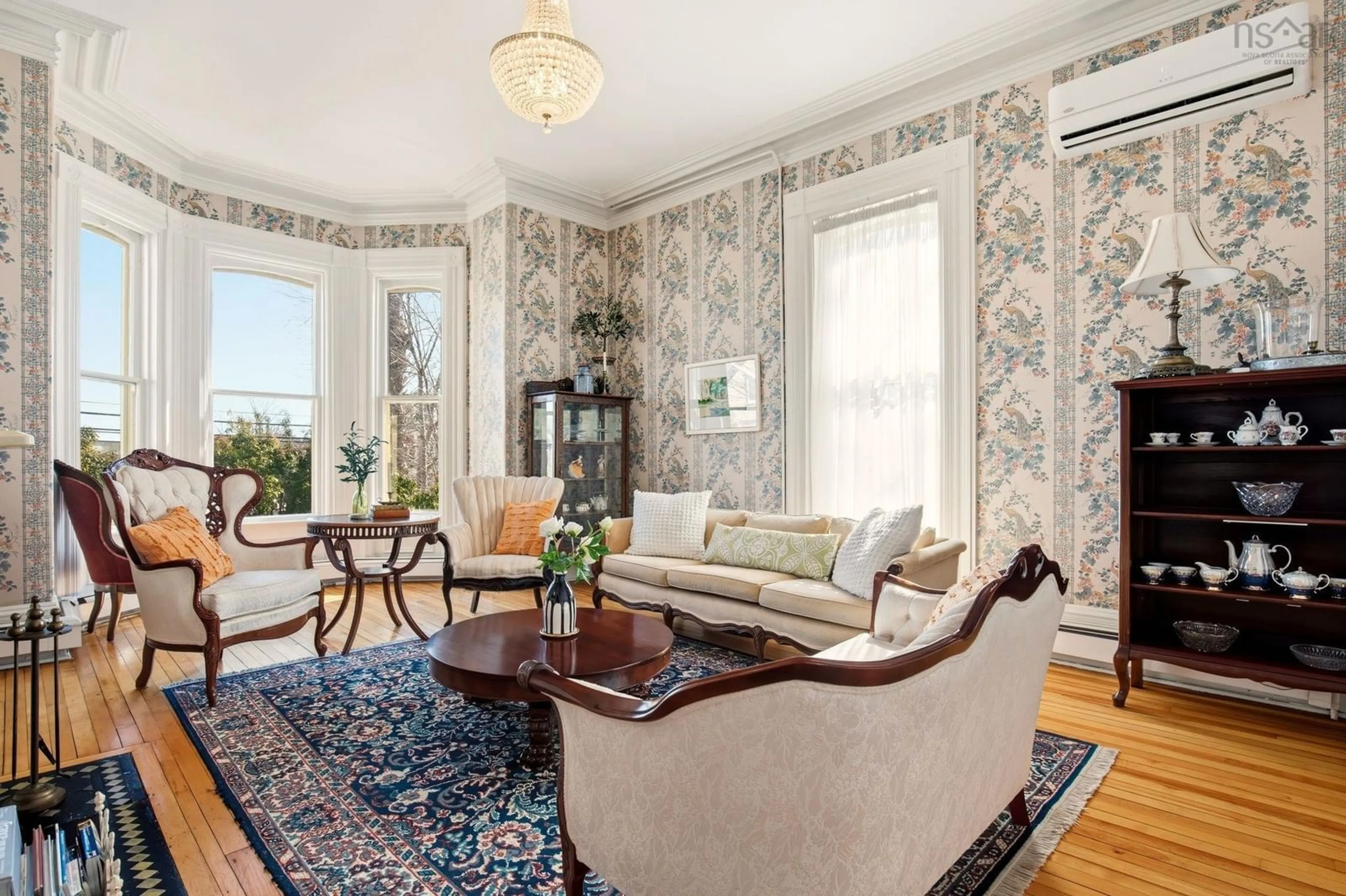 Living room with furniture, carpet floor for 42 Falkland St, Lunenburg Nova Scotia B0J 2C0