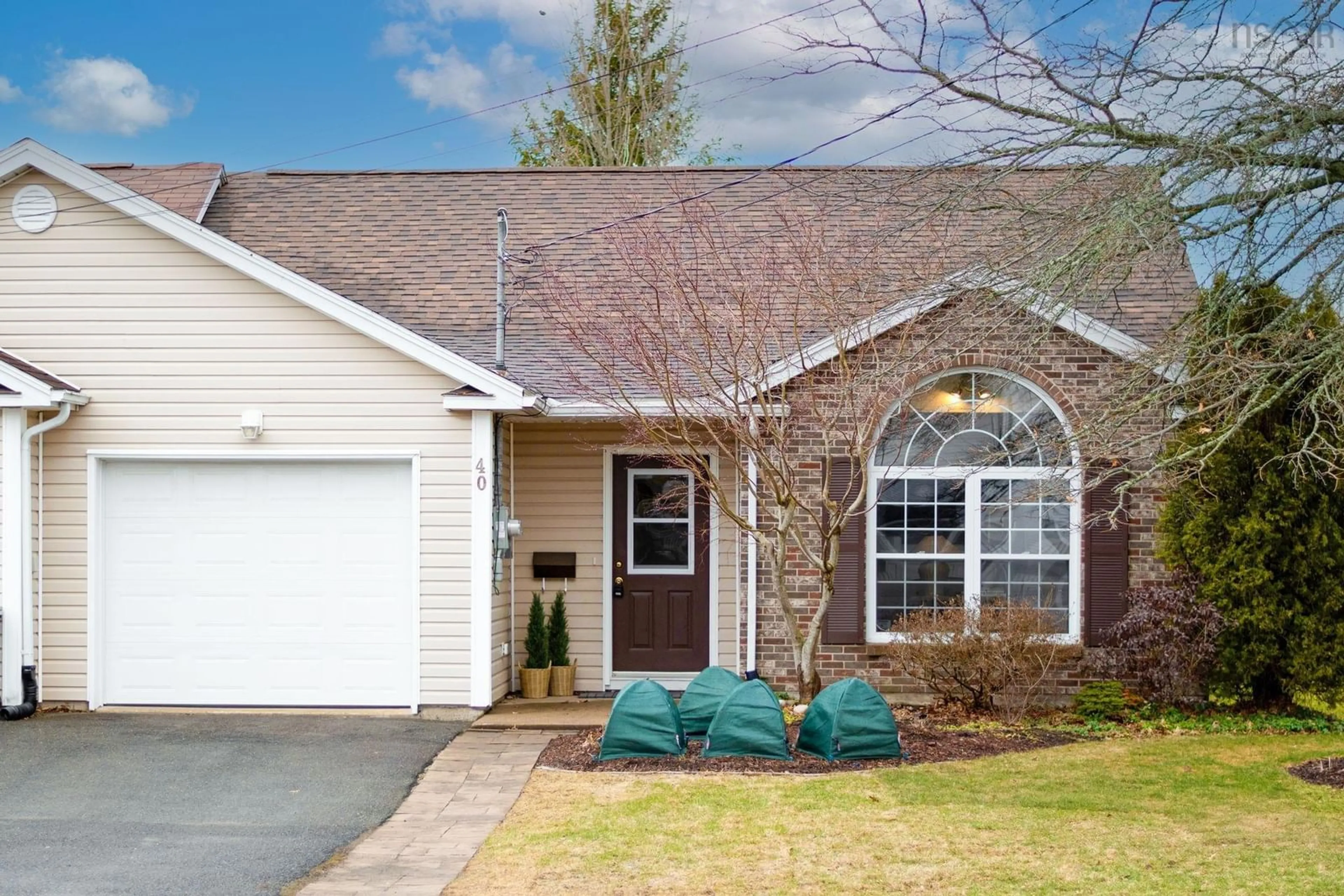 Home with vinyl exterior material, street for 40 Cherry Lane, Wolfville Nova Scotia B4P 1T6