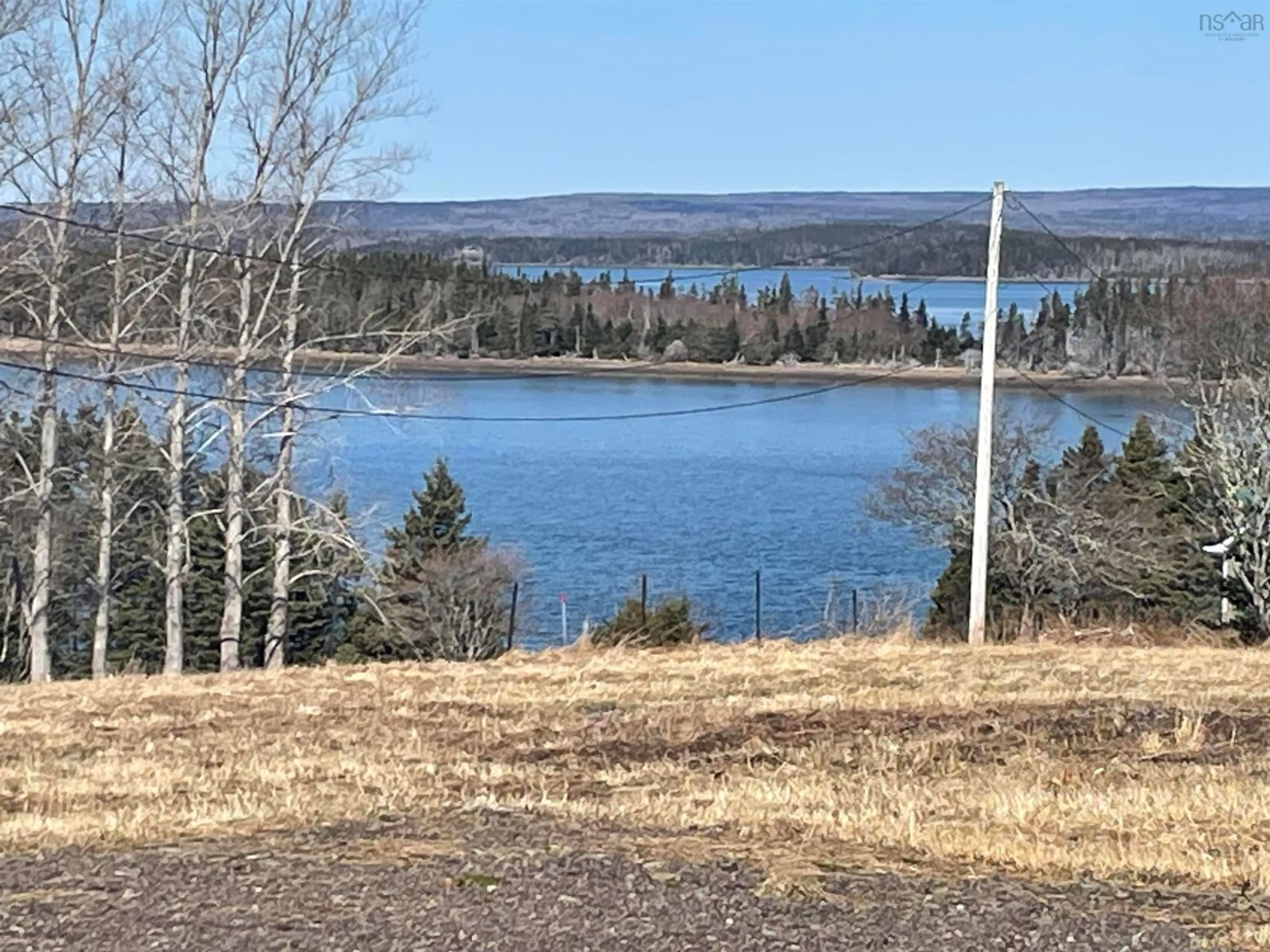 A pic from outside/outdoor area/front of a property/back of a property/a pic from drone, water/lake/river/ocean view for 27 Cap La Ronde Rd, D'Escousse Nova Scotia B0E 1K0