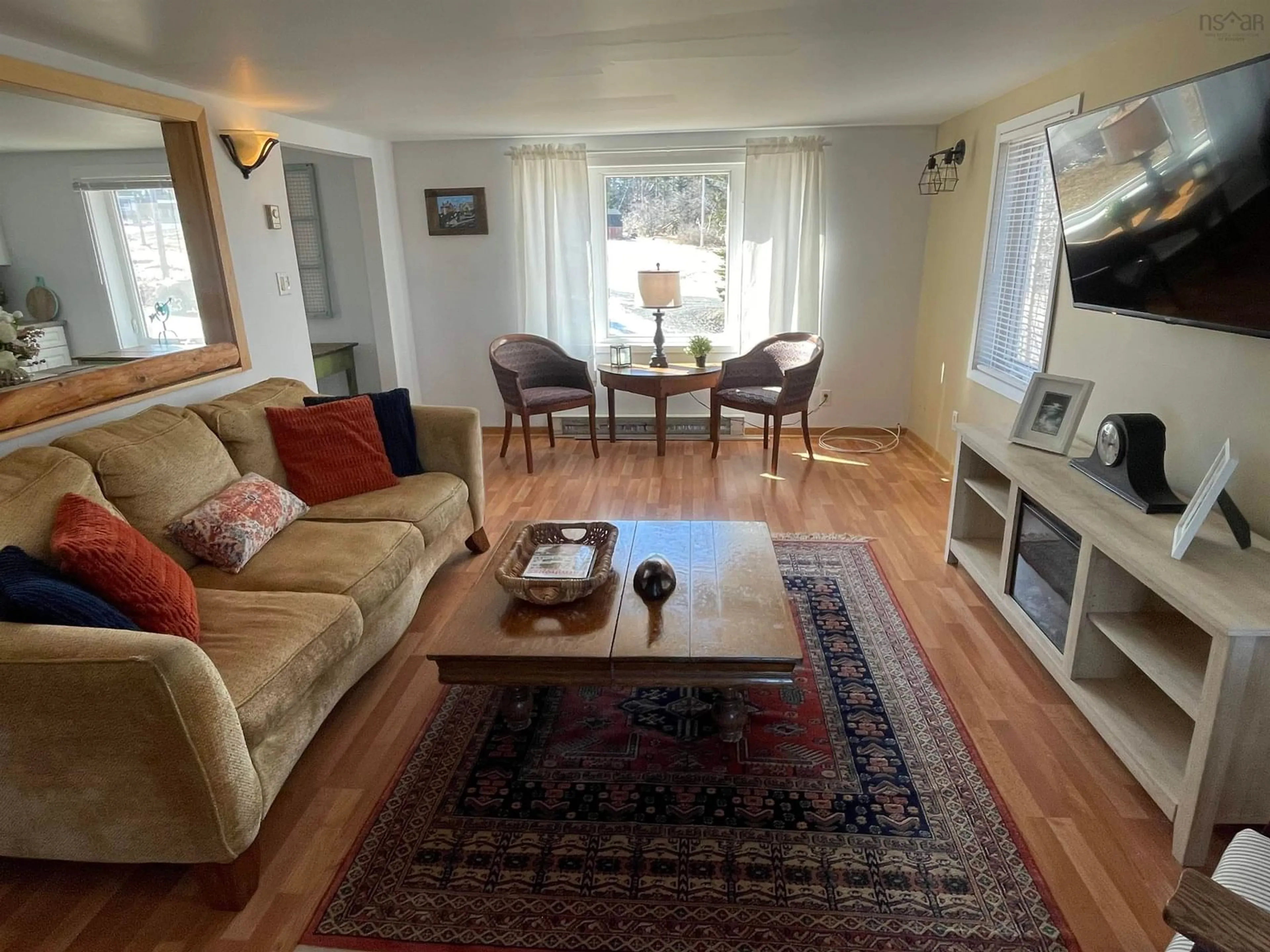 Living room with furniture, unknown for 27 Cap La Ronde Rd, D'Escousse Nova Scotia B0E 1K0
