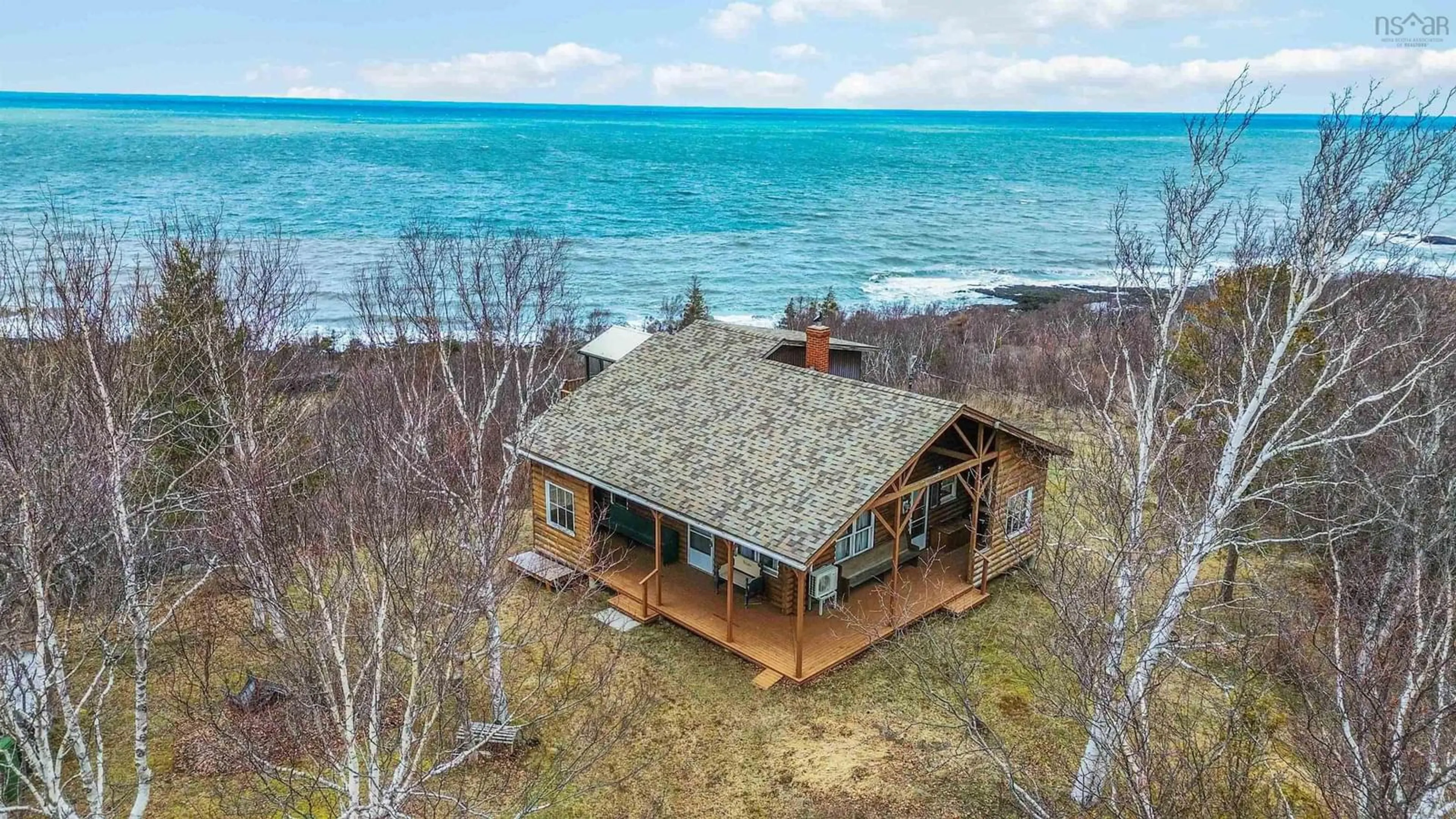 A pic from outside/outdoor area/front of a property/back of a property/a pic from drone, water/lake/river/ocean view for 4805 Shore Rd, Parkers Cove Nova Scotia B0S 1A0