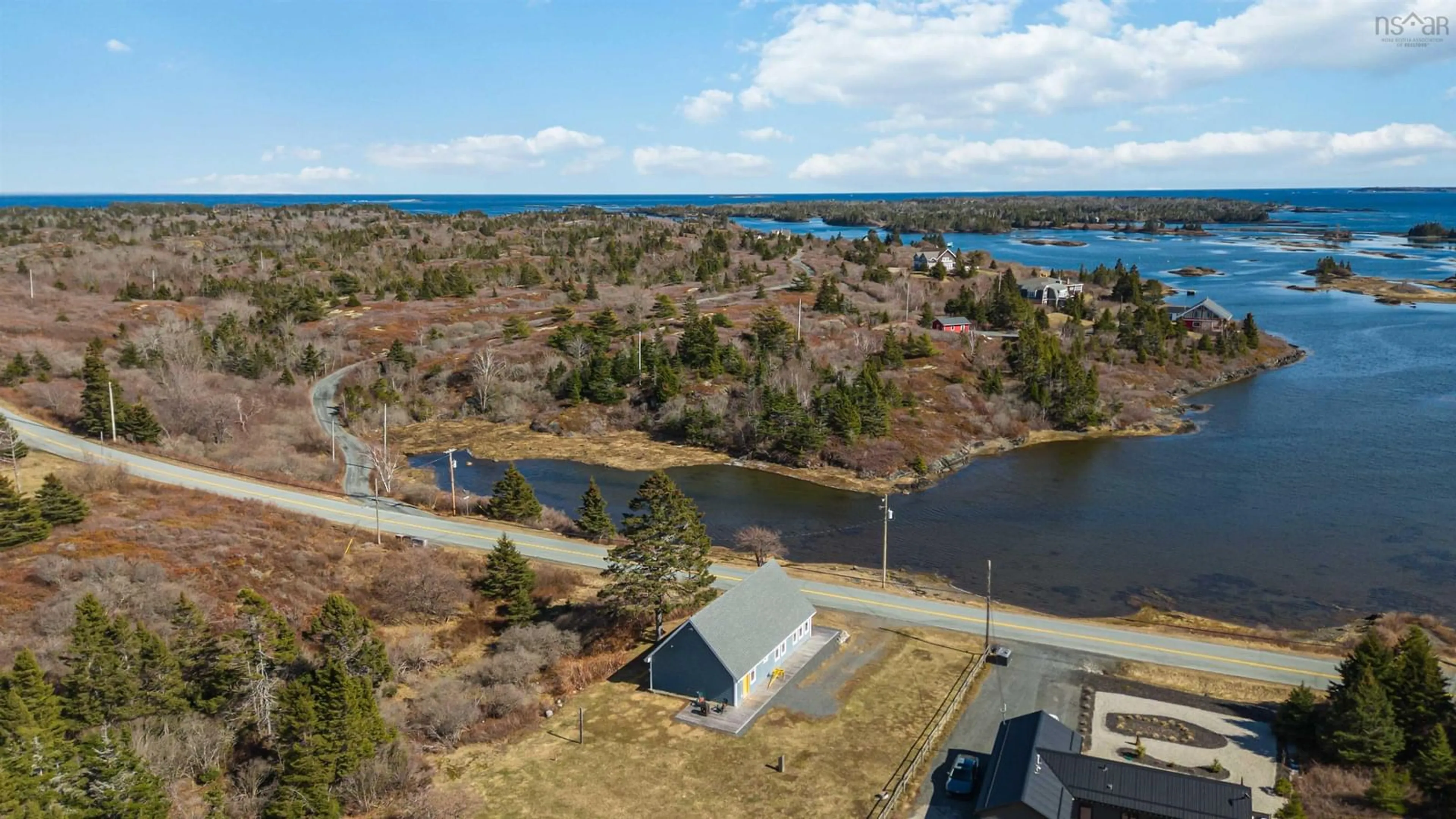 A pic from outside/outdoor area/front of a property/back of a property/a pic from drone, water/lake/river/ocean view for 109 Stonehurst Rd, Blue Rocks Nova Scotia B0J 2C0