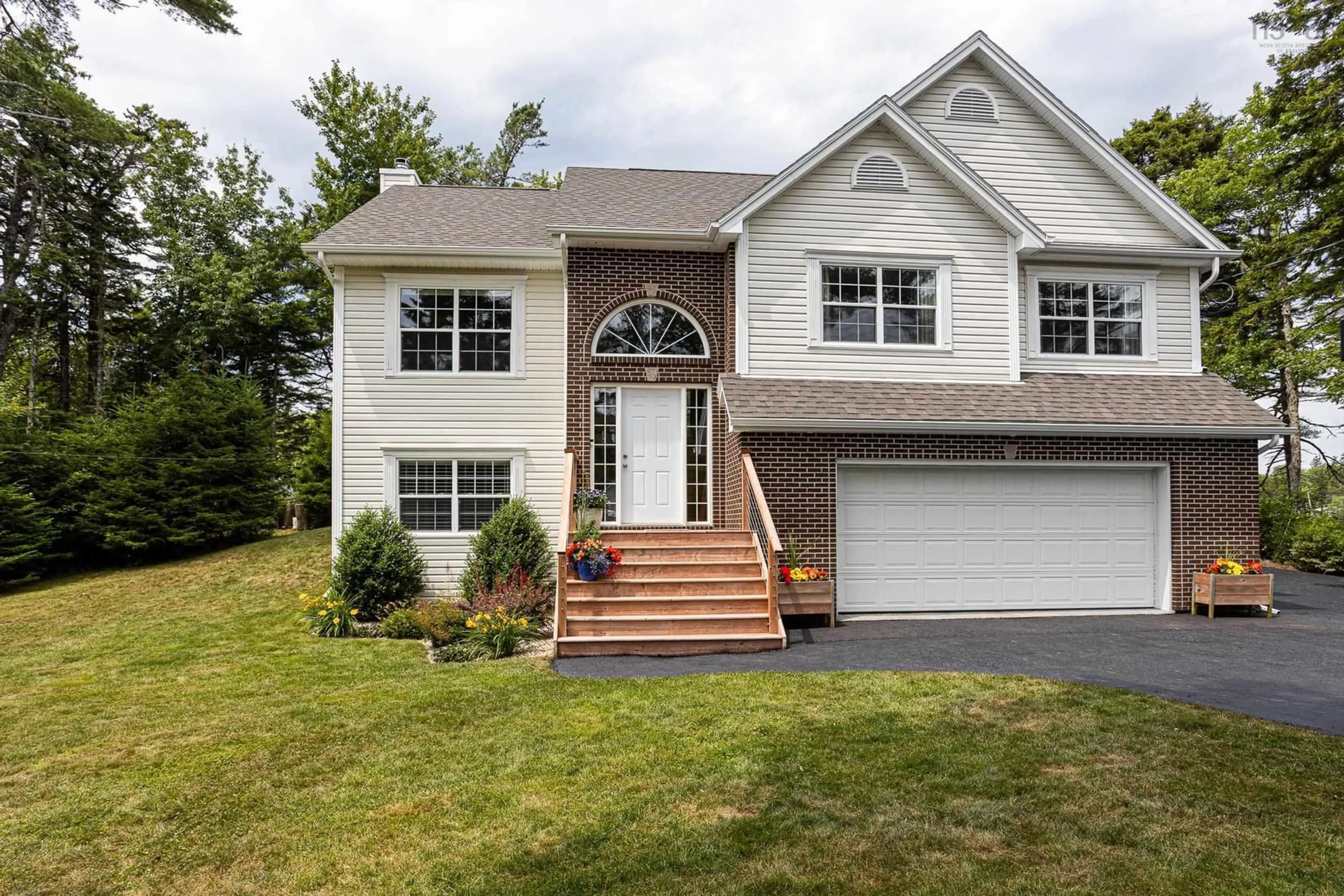 Home with vinyl exterior material, street for 18 Stonehenge Lane, Upper Tantallon Nova Scotia B3Z 4J6