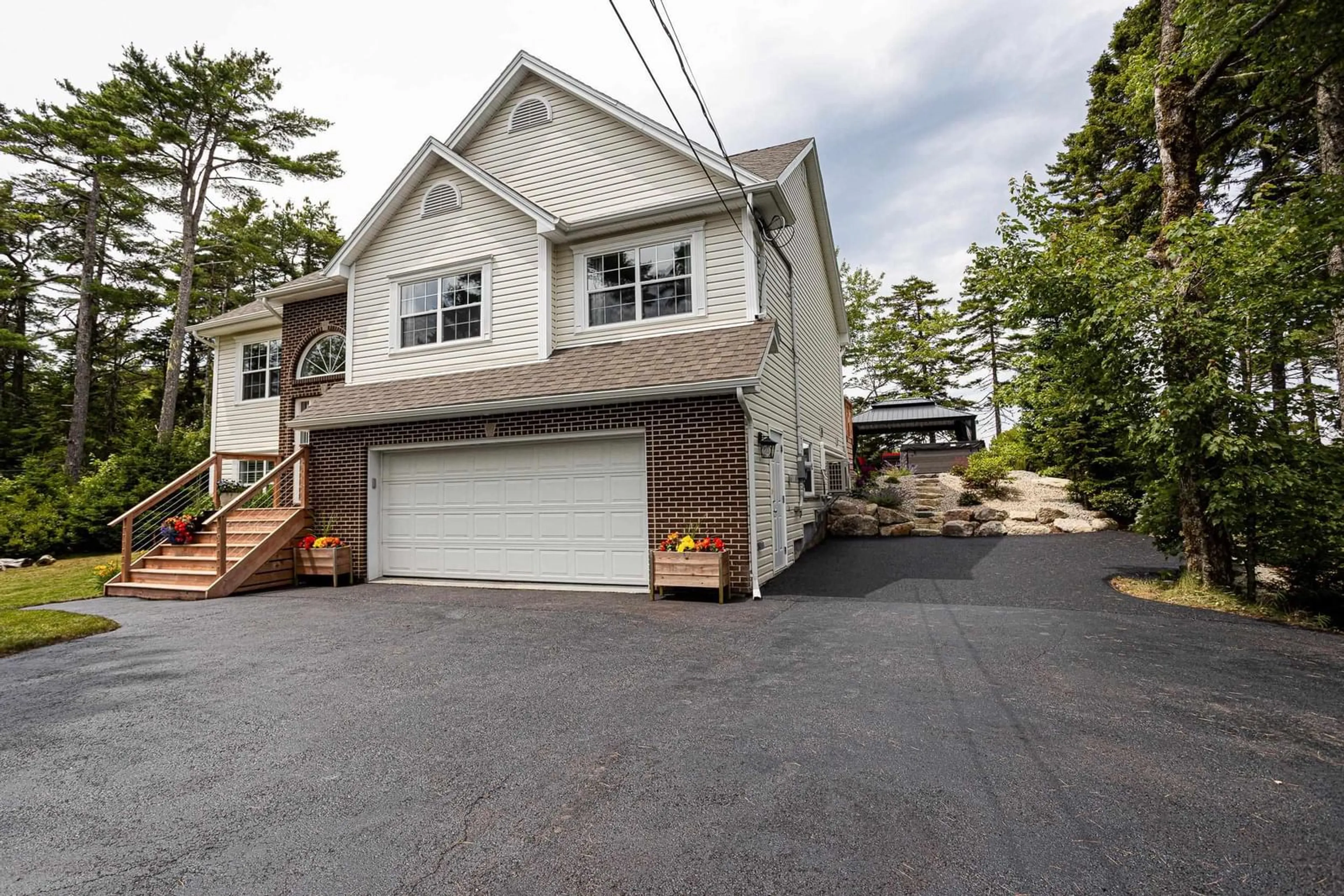 Home with vinyl exterior material, street for 18 Stonehenge Lane, Upper Tantallon Nova Scotia B3Z 4J6