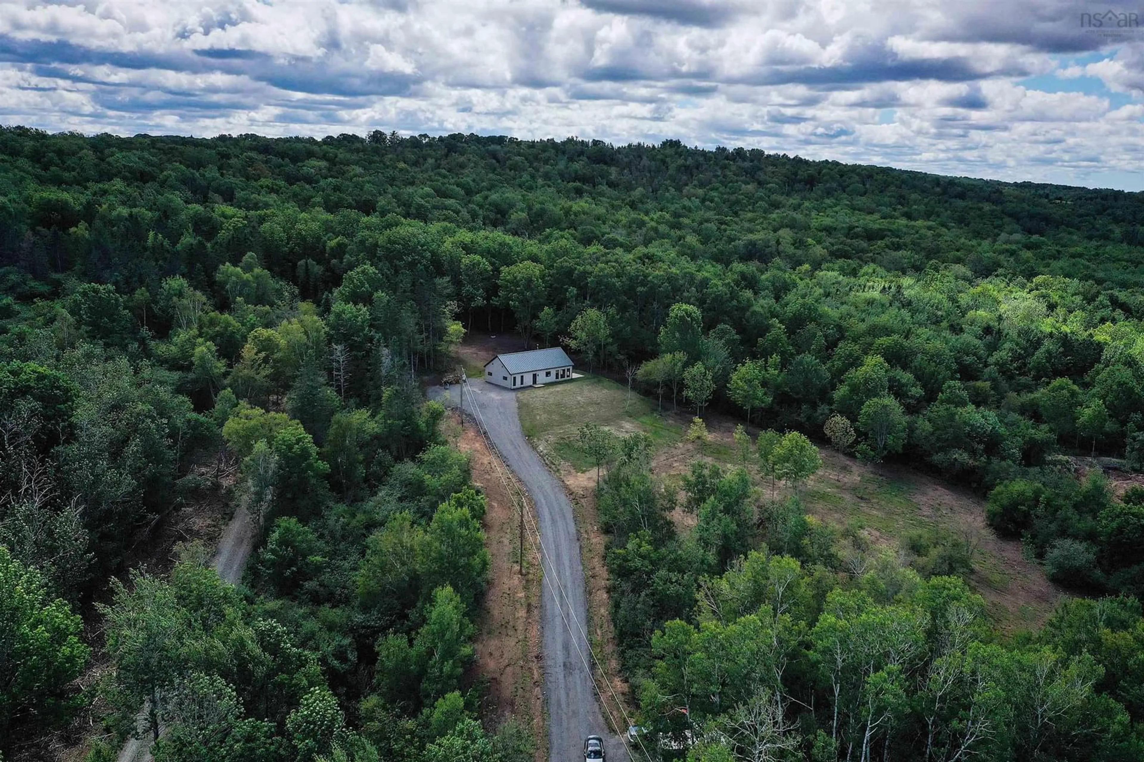 A pic from outside/outdoor area/front of a property/back of a property/a pic from drone, forest/trees view for 800 Bluff Rd, Lockhartville Nova Scotia B0P 1H0