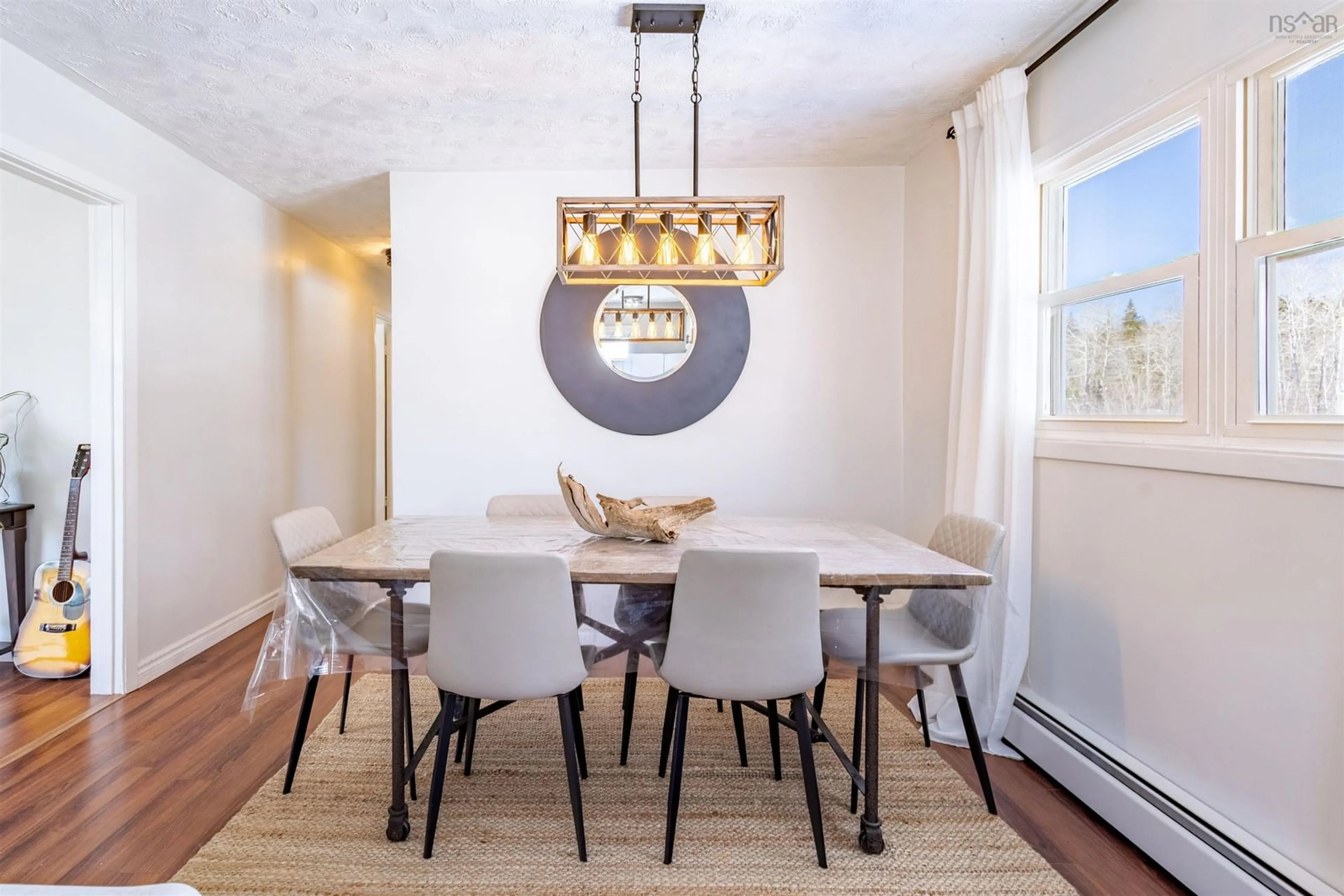 Dining room, wood/laminate floor for 49742 Cabot Trail, Goose Cove Nova Scotia B0E 1B0