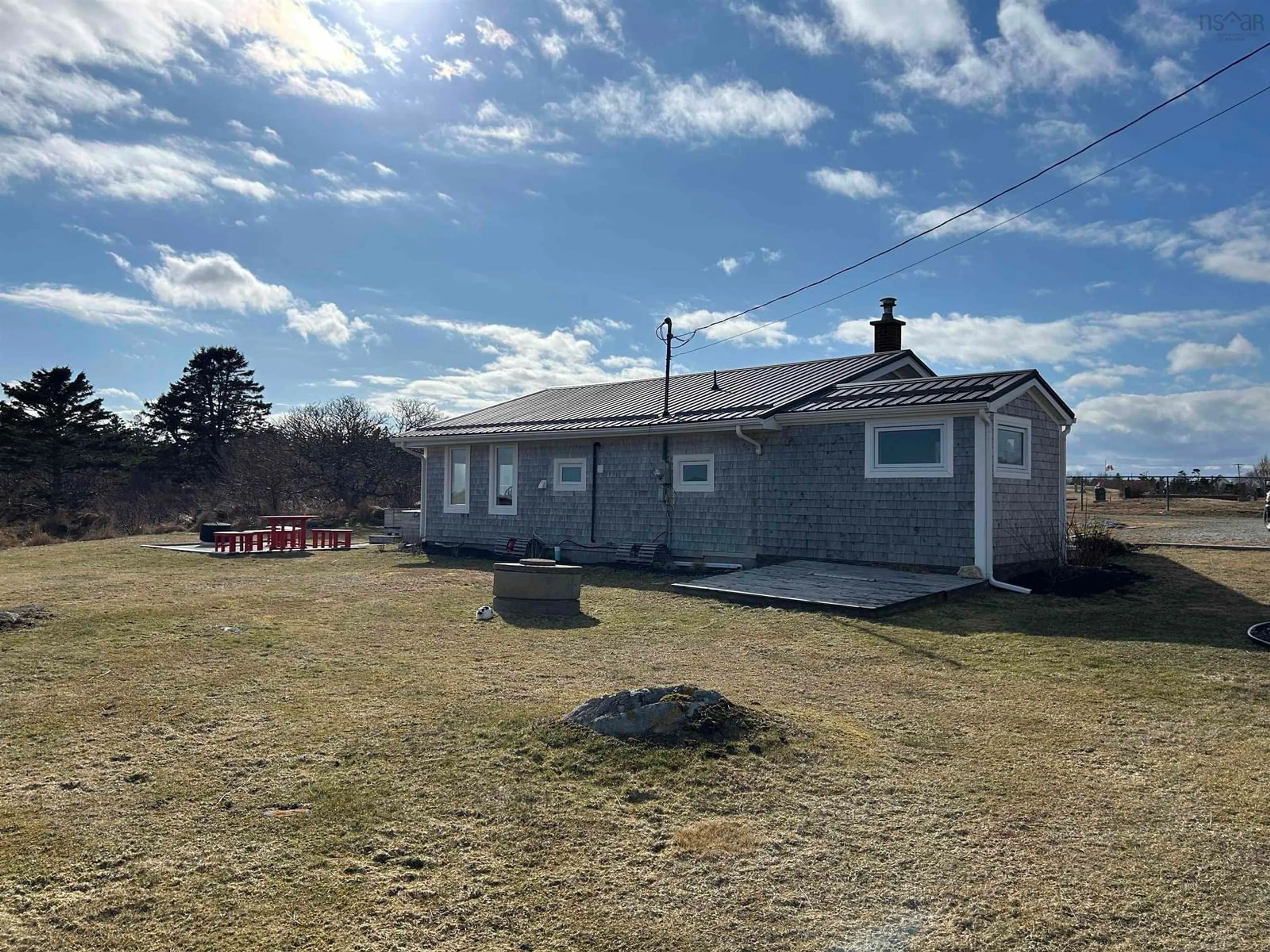 A pic from outside/outdoor area/front of a property/back of a property/a pic from drone, building for 68 Daniels Head Rd, South Side Nova Scotia B0W 1P0