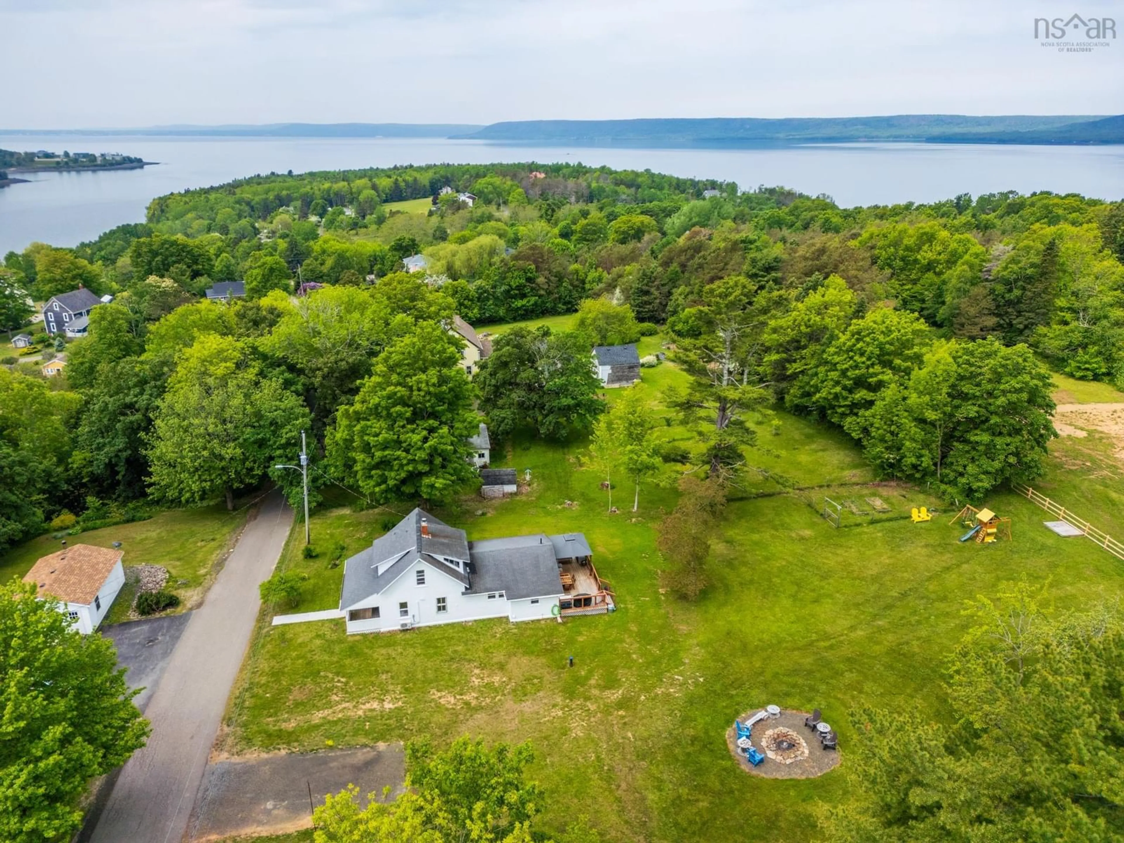 A pic from outside/outdoor area/front of a property/back of a property/a pic from drone, water/lake/river/ocean view for 51 Shawmut Ave, Clementsport Nova Scotia B0S 1A0
