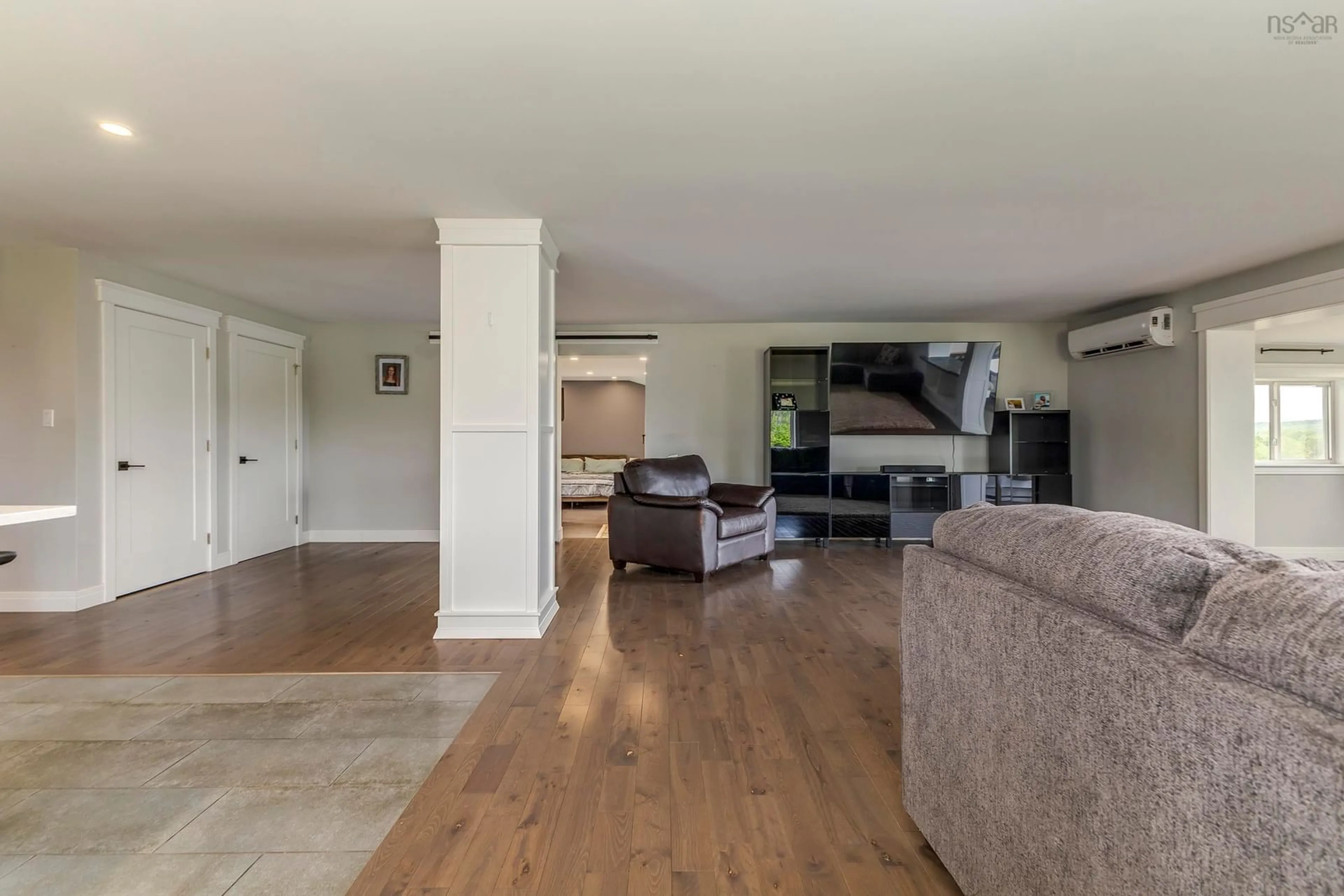 Living room with furniture, wood/laminate floor for 271 376 Hwy, Central West River Nova Scotia B0K 1H0
