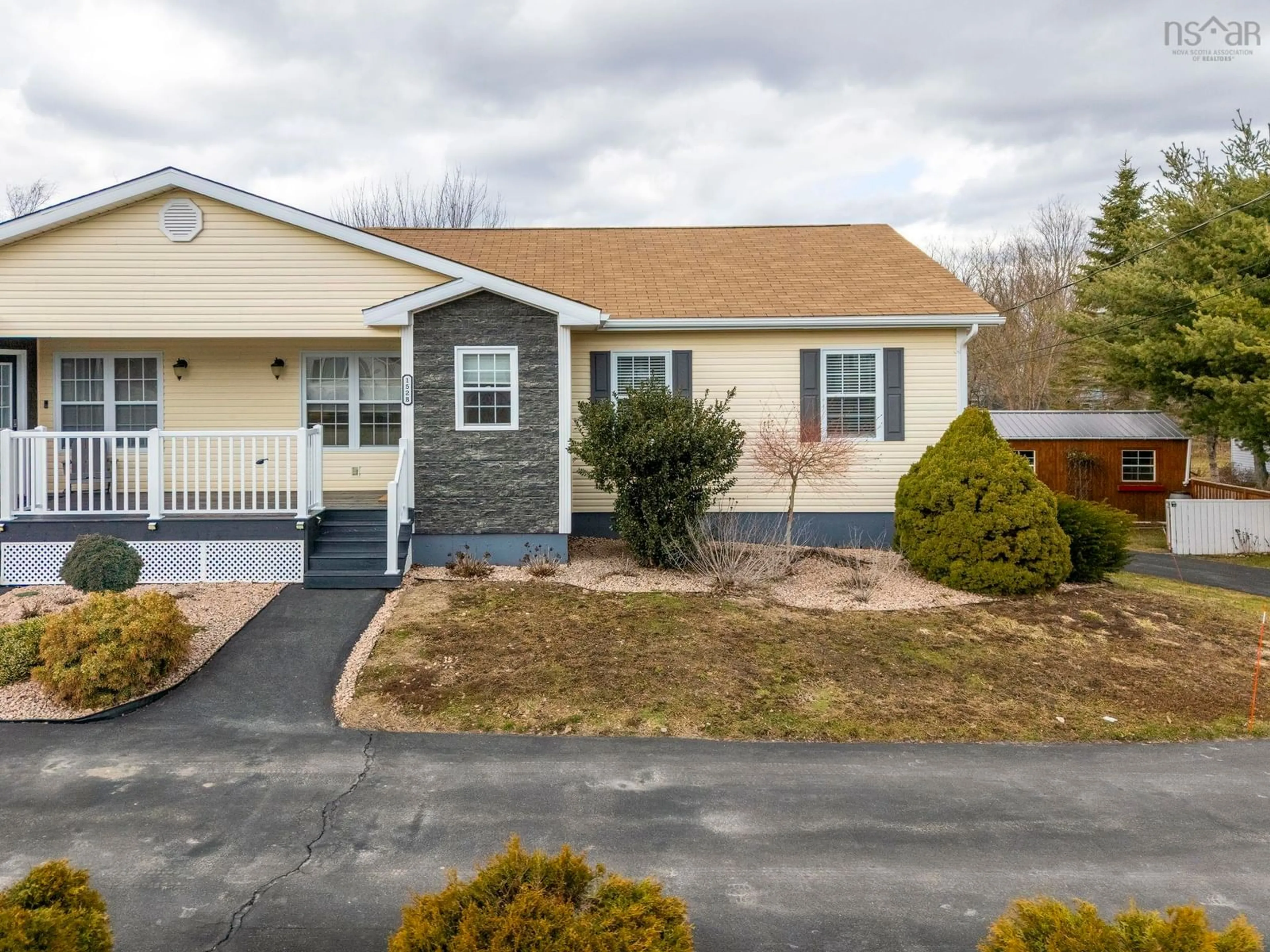 Home with vinyl exterior material, street for 152B Orchard St, Berwick Nova Scotia B0P 1E0