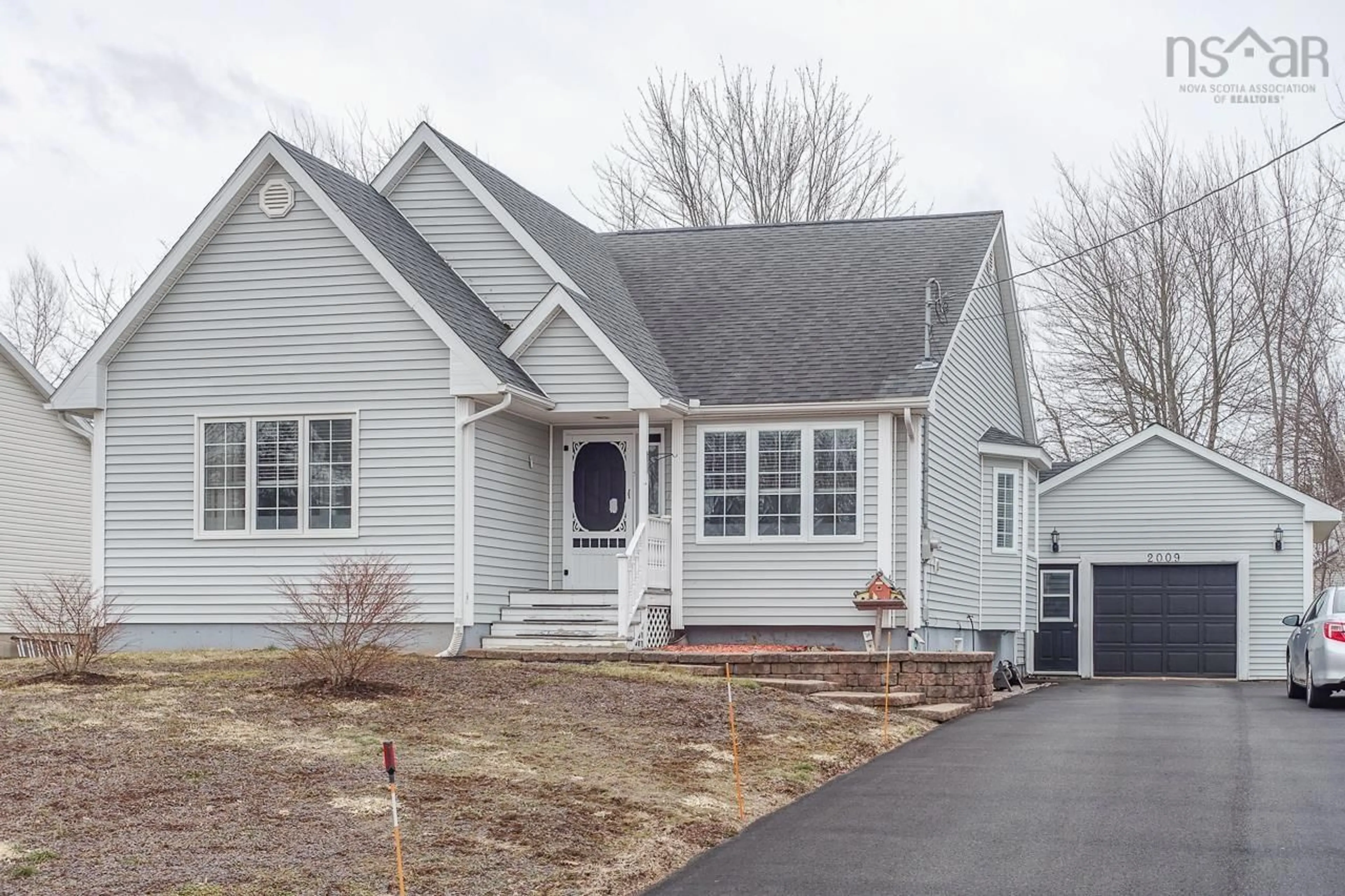 Home with vinyl exterior material, street for 2009 Langille Dr, Kings County Nova Scotia B4R 1C3