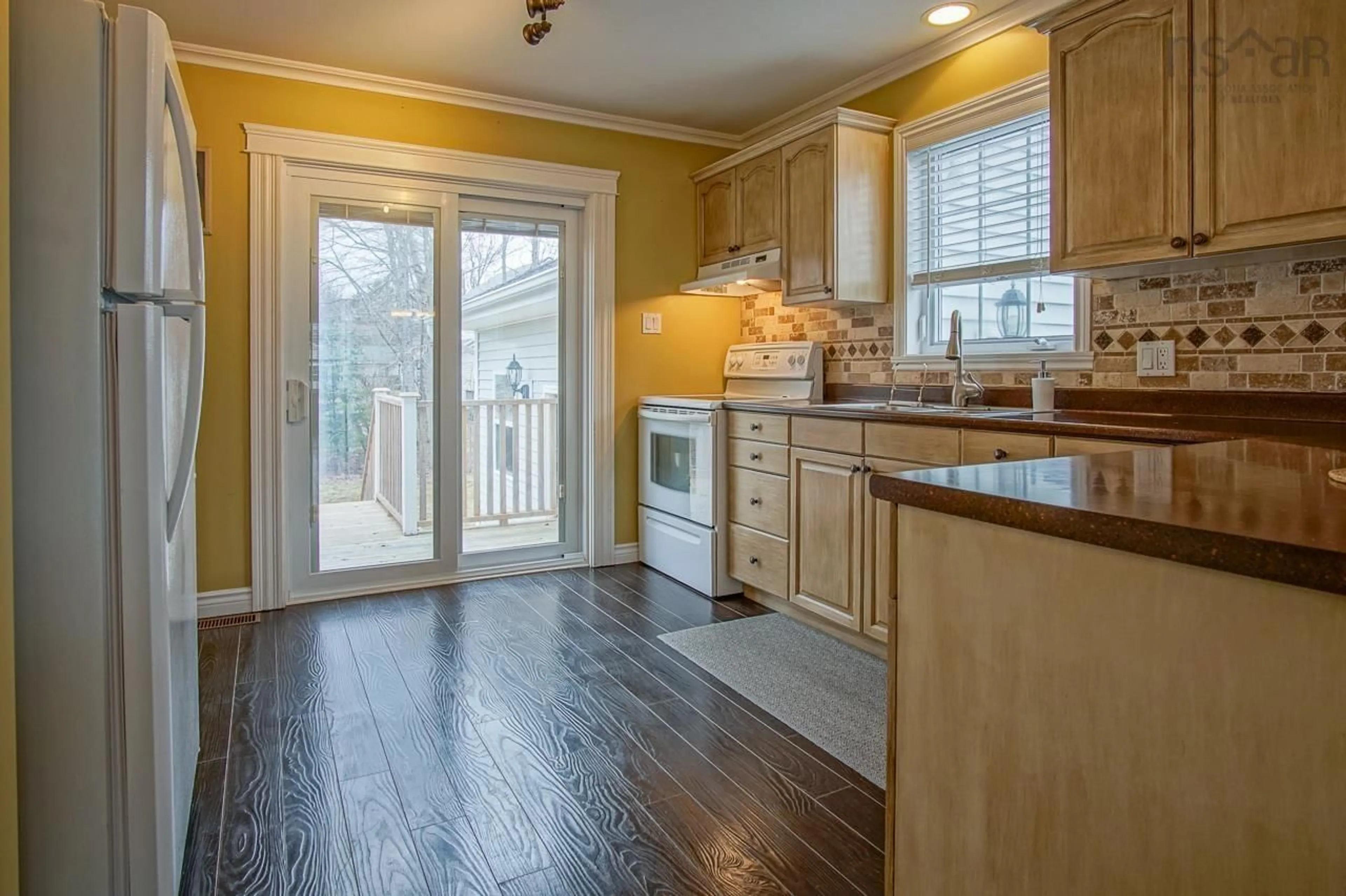 Open concept kitchen, wood/laminate floor for 2009 Langille Dr, Kings County Nova Scotia B4R 1C3
