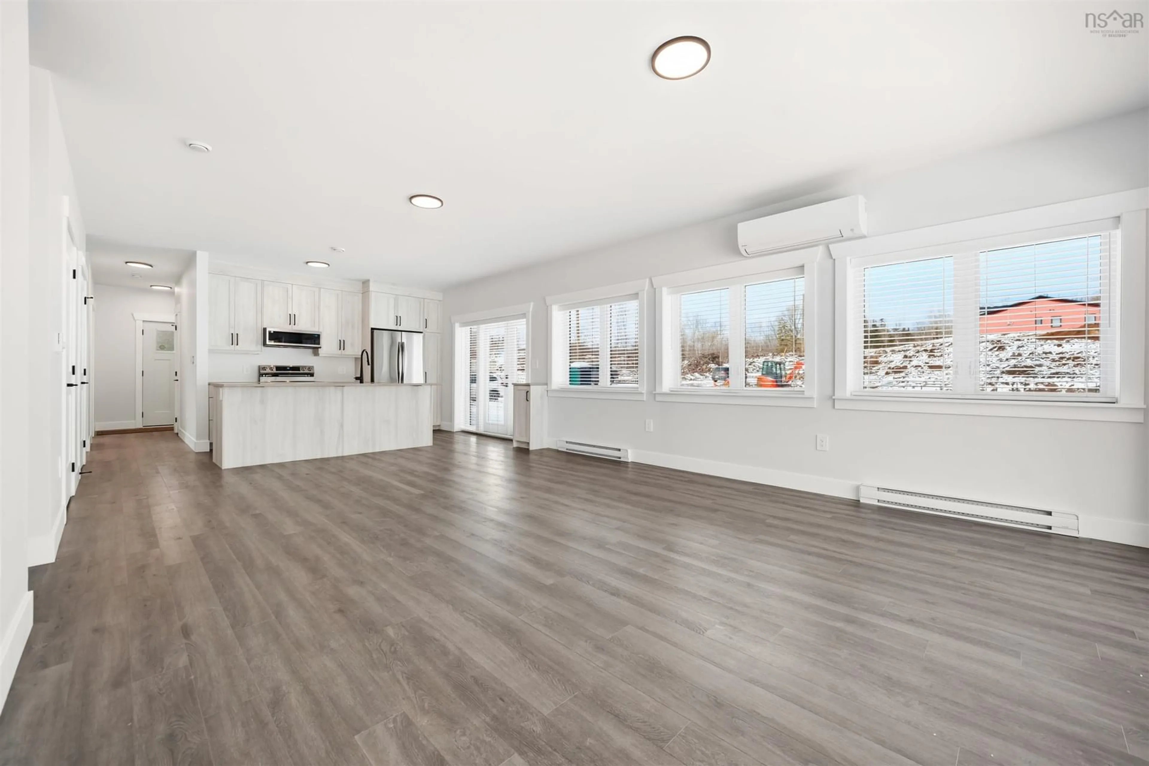 Open concept kitchen, wood/laminate floor for 6 Michaela St, Pictou Nova Scotia B0K 1H0