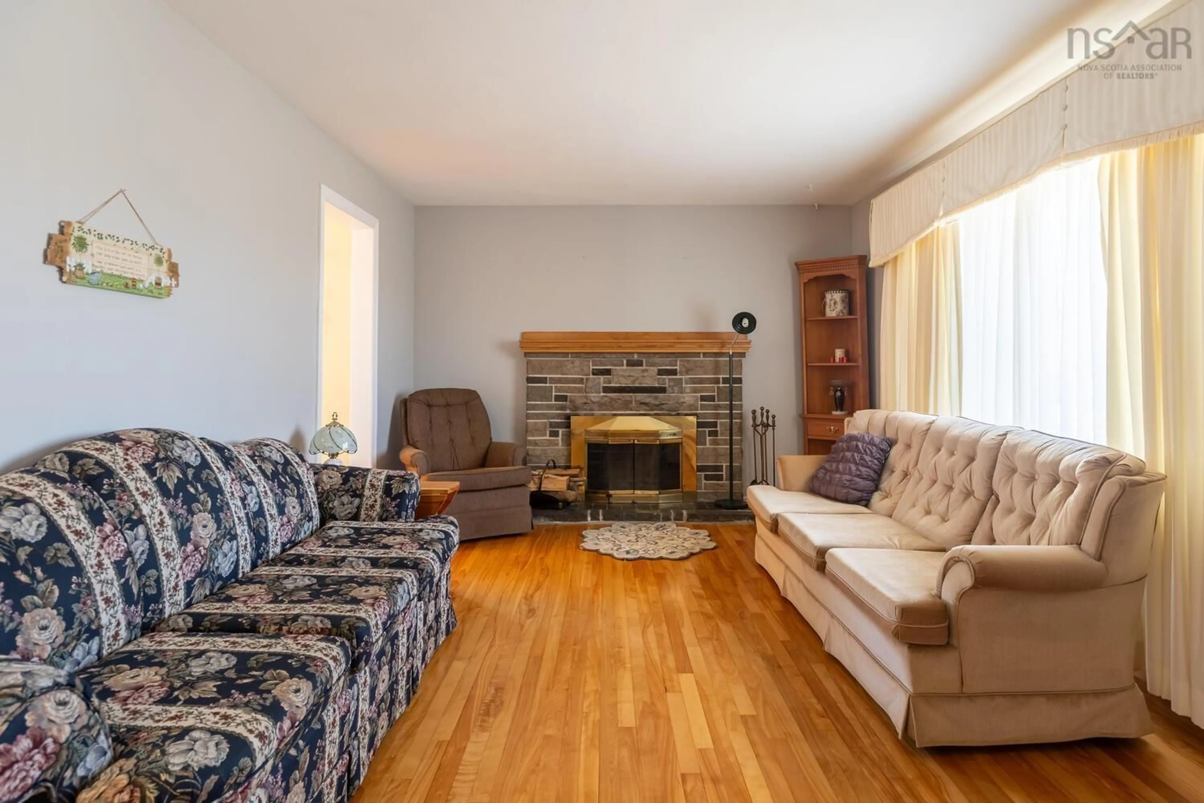 Living room with furniture, wood/laminate floor for 1 Juniper Cres, Leiblin Park Nova Scotia B3R 2H3