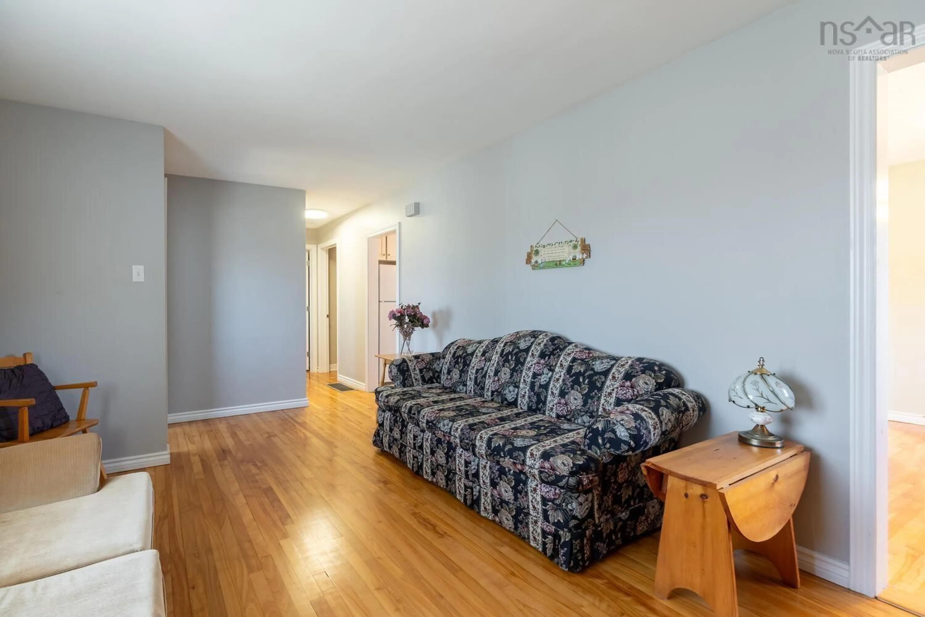 Living room with furniture, wood/laminate floor for 1 Juniper Cres, Leiblin Park Nova Scotia B3R 2H3