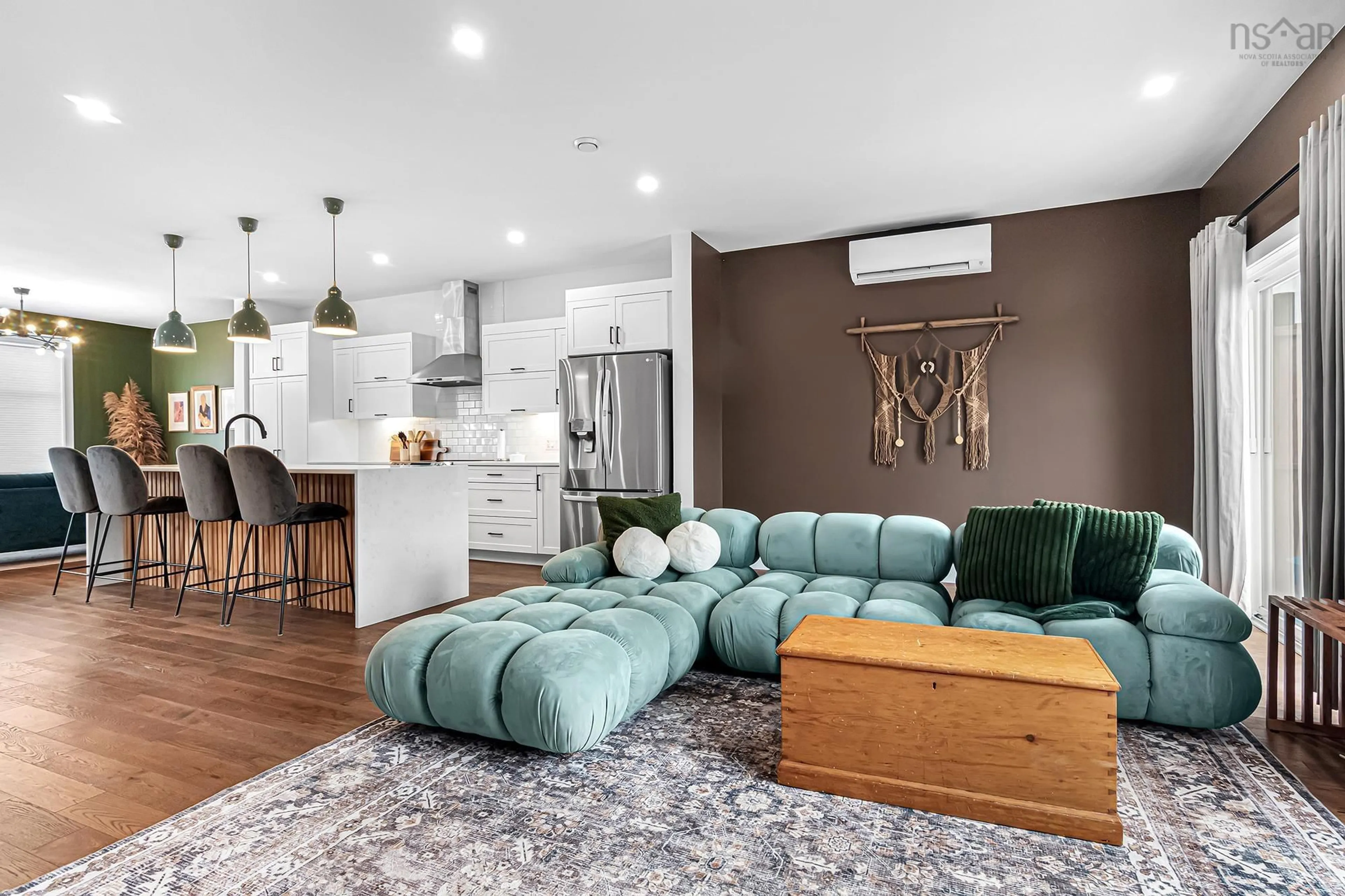 Living room with furniture, wood/laminate floor for 23 Amalfi Way, Timberlea Nova Scotia B3T 0K3