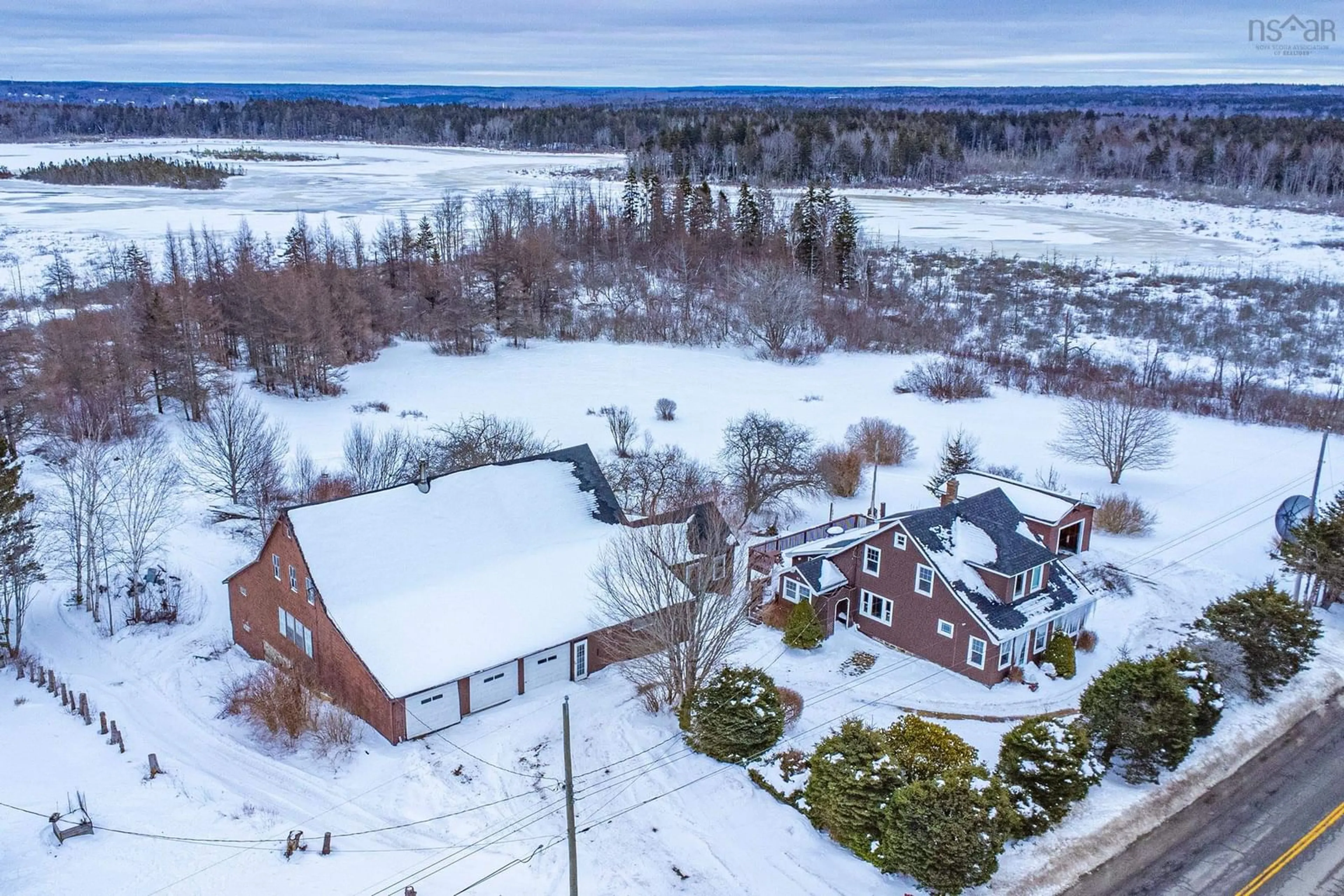 A pic from outside/outdoor area/front of a property/back of a property/a pic from drone, unknown for 91 Townshipline Rd, Weymouth Nova Scotia B0W 3T0