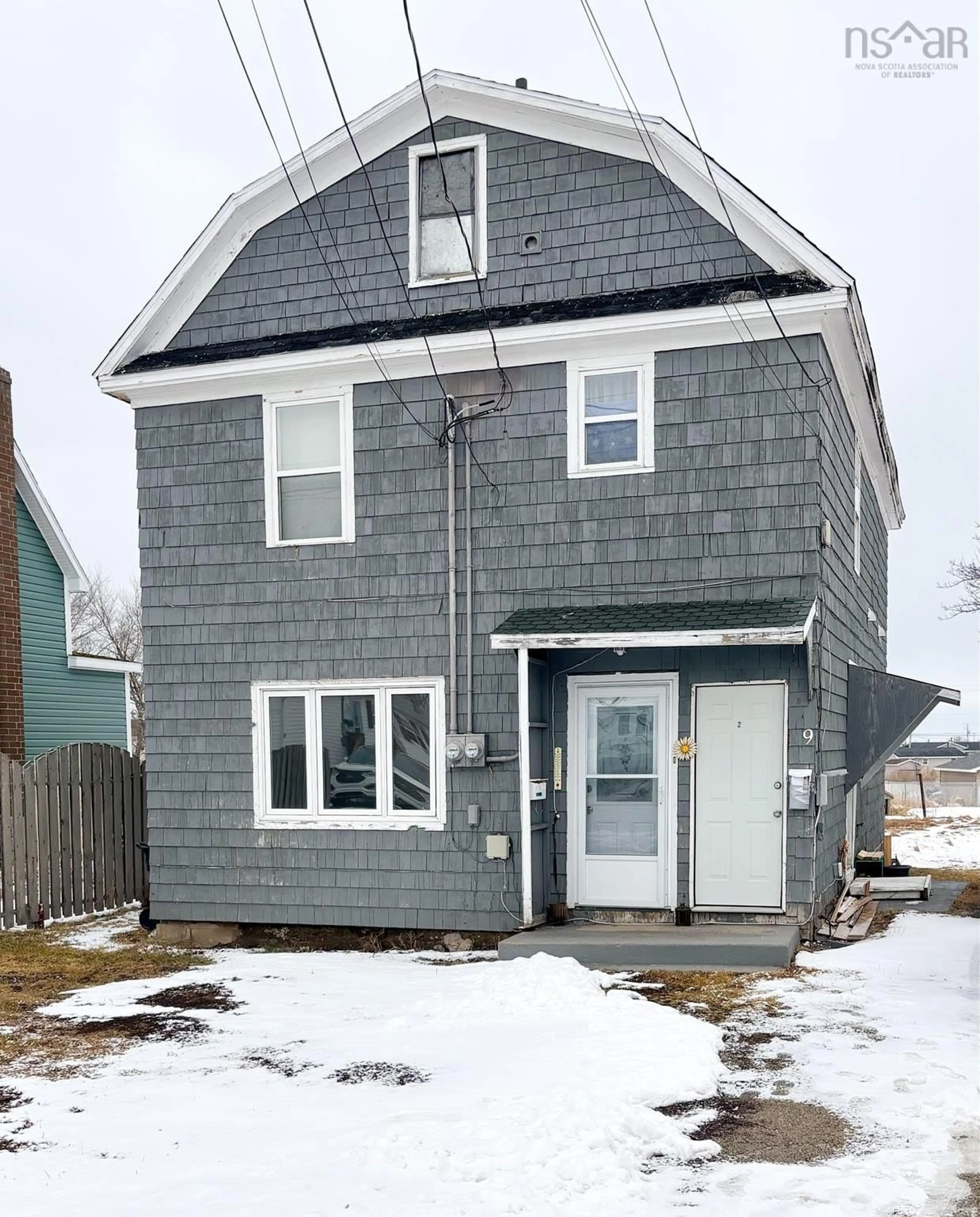 Home with vinyl exterior material, street for 9 Burchell St, Sydney Mines Nova Scotia B1V 2P9