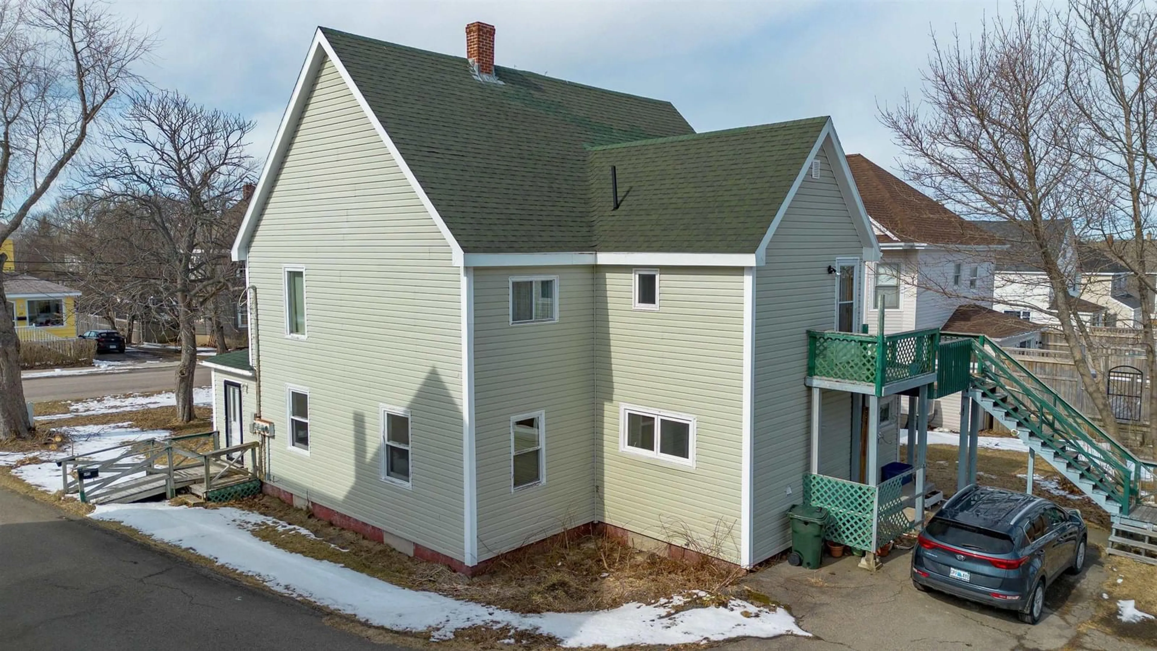 A pic from outside/outdoor area/front of a property/back of a property/a pic from drone, building for 19 Beech St, Sydney Mines Nova Scotia B1V 1E9
