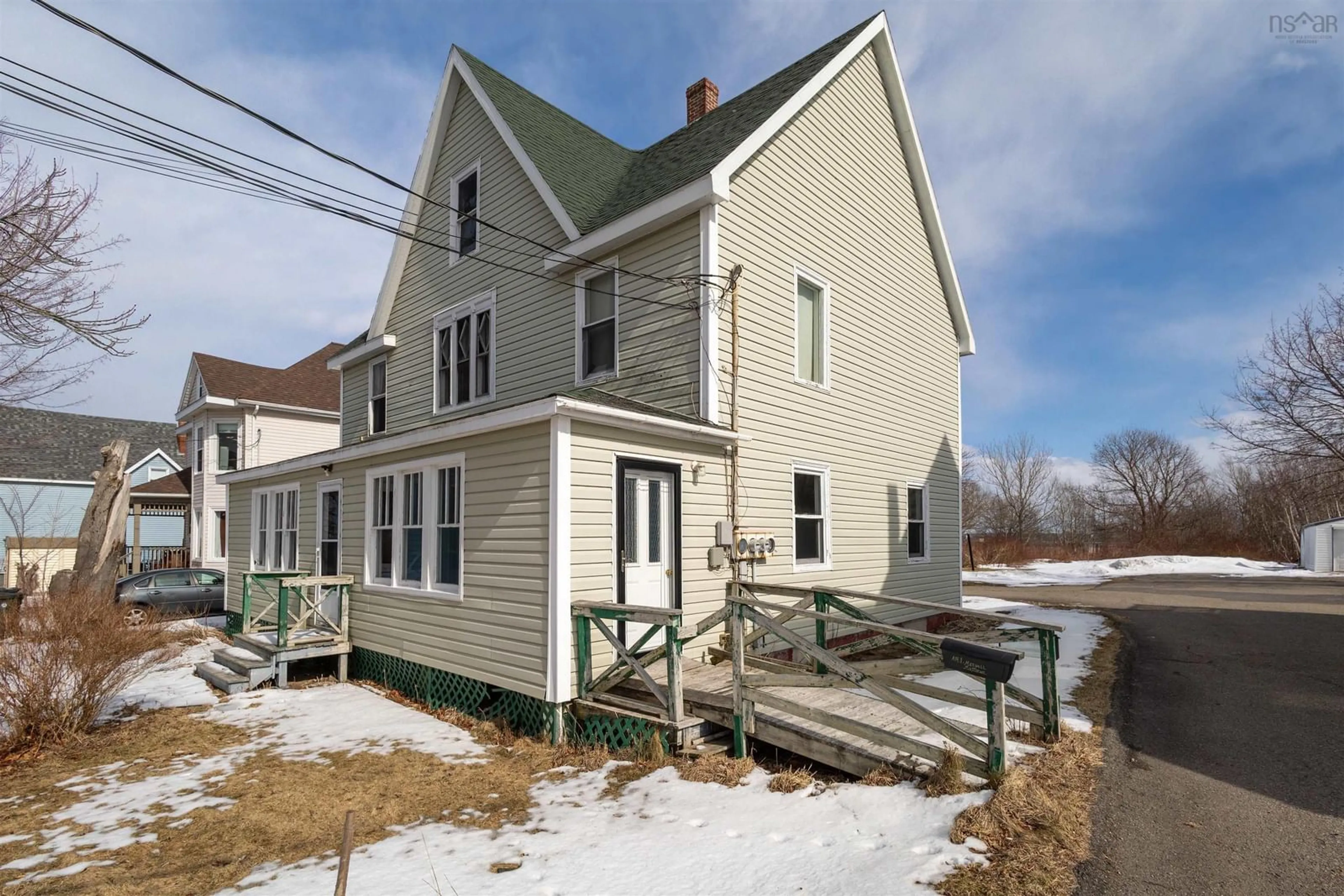 Home with vinyl exterior material, street for 19 Beech St, Sydney Mines Nova Scotia B1V 1E9