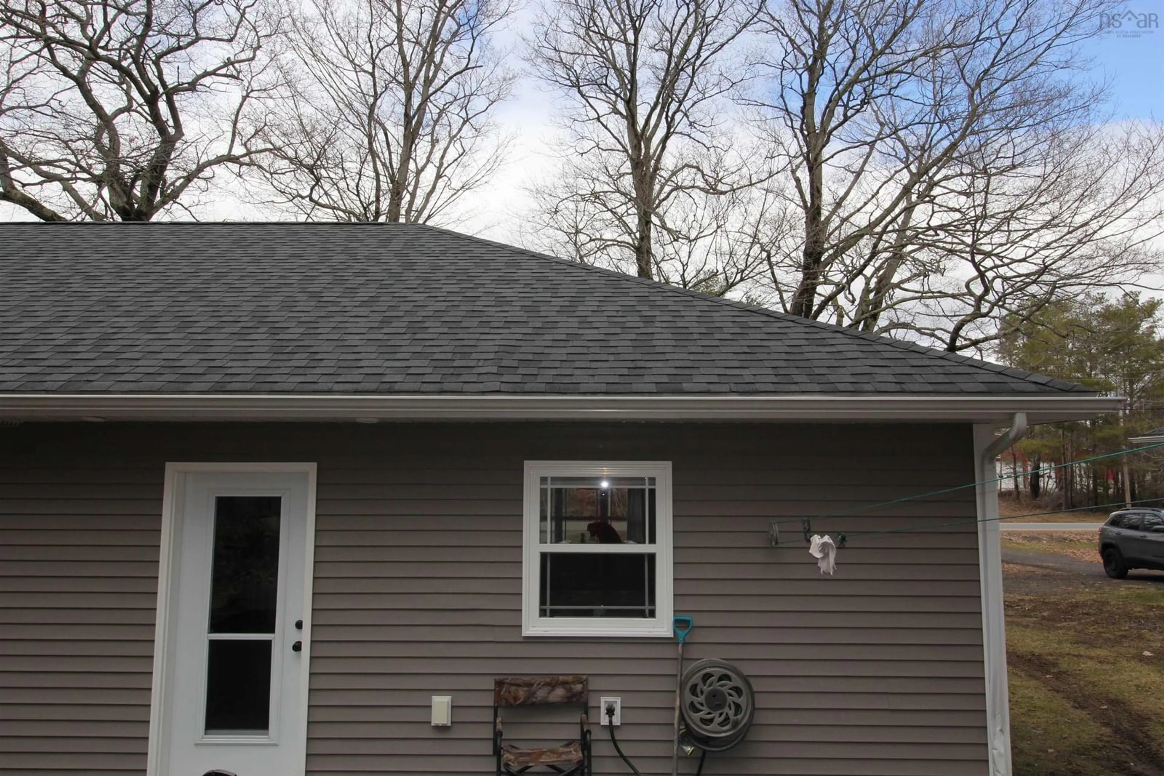 Home with vinyl exterior material, street for 1074 Station Road Rd, Aylesford Nova Scotia B0P 1C0