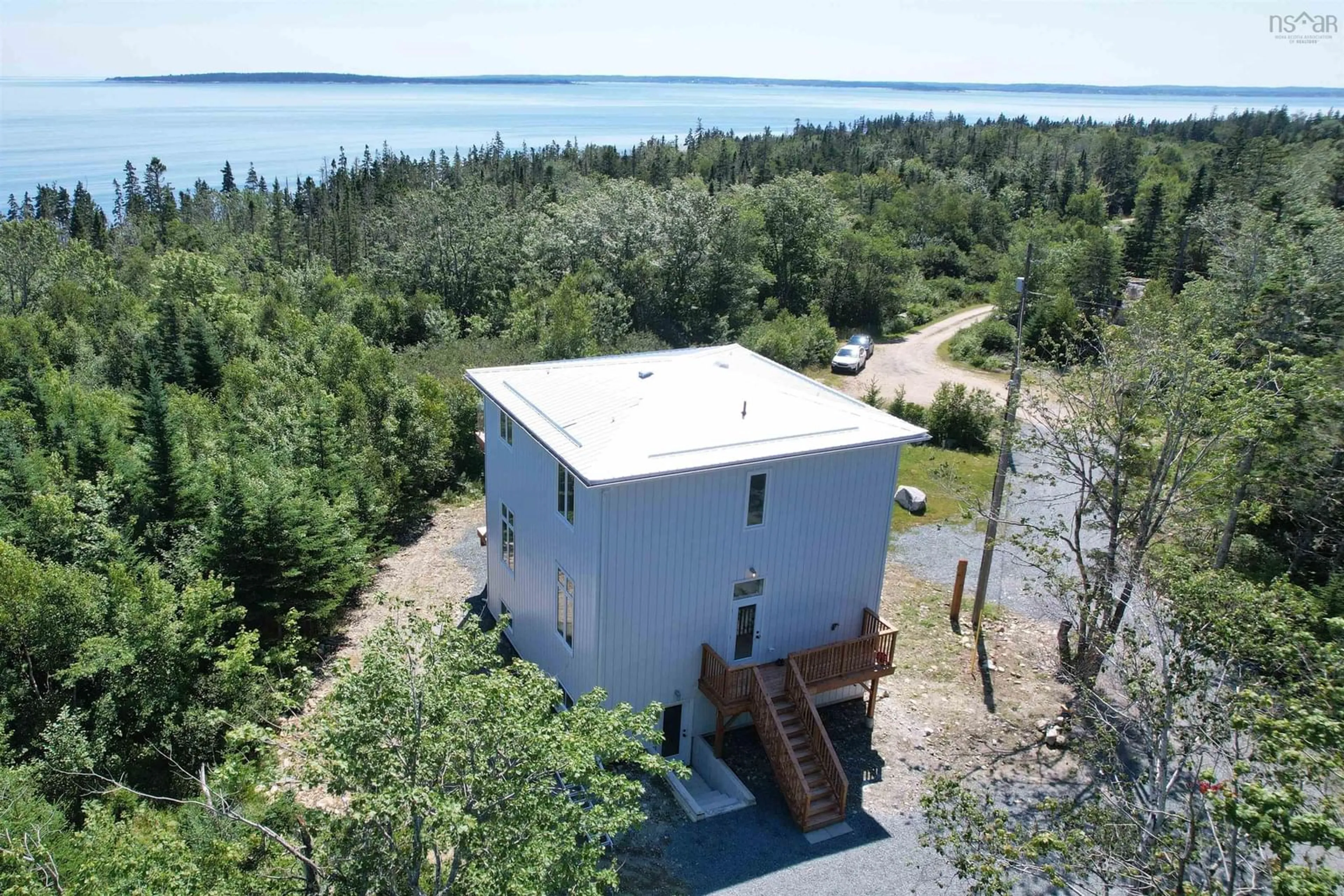 A pic from outside/outdoor area/front of a property/back of a property/a pic from drone, water/lake/river/ocean view for 119 Everetts Way, Hunts Point Nova Scotia B0T 1G0