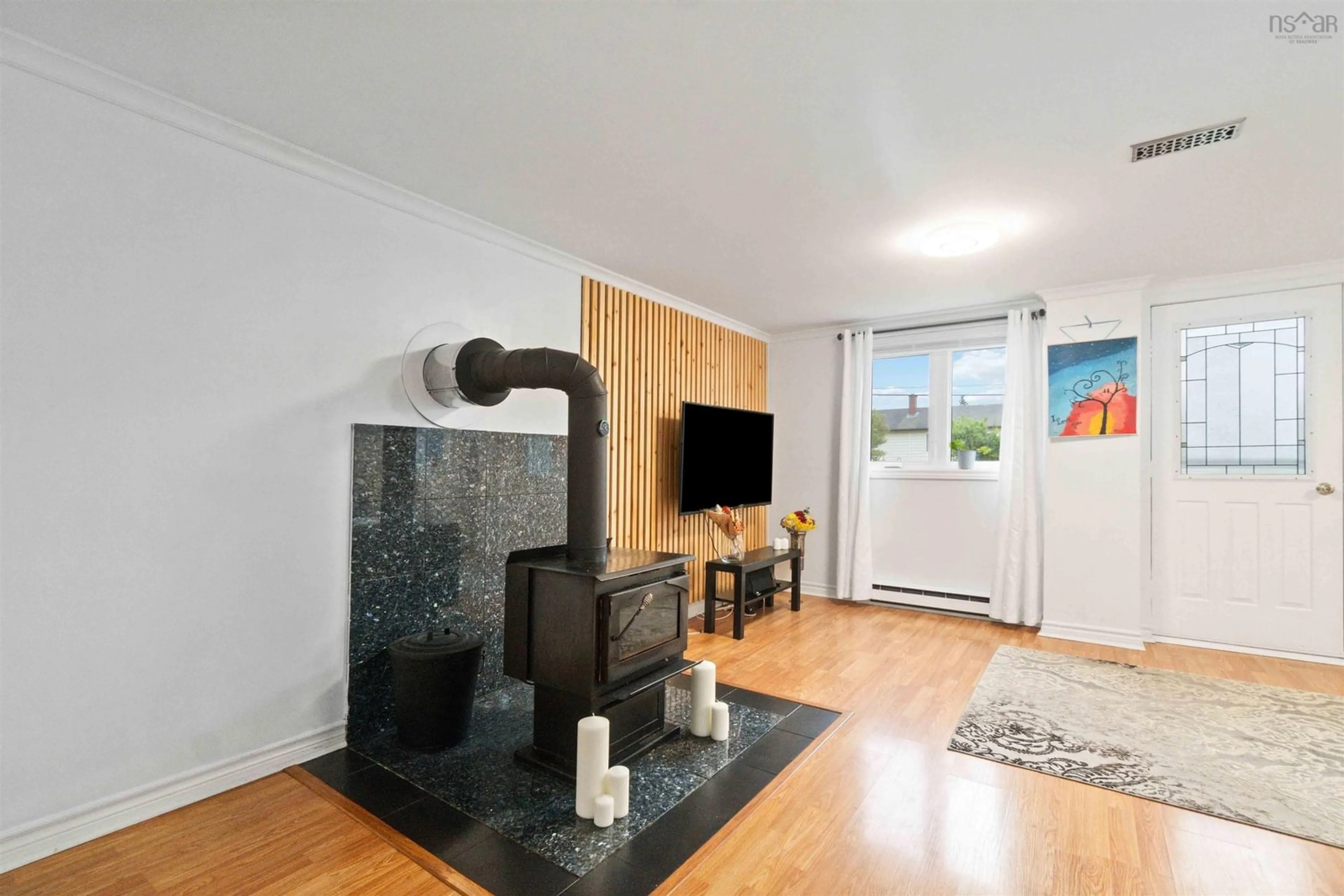 Living room with furniture, wood/laminate floor for 40 Hornes Rd, Eastern Passage Nova Scotia B3G 1A5