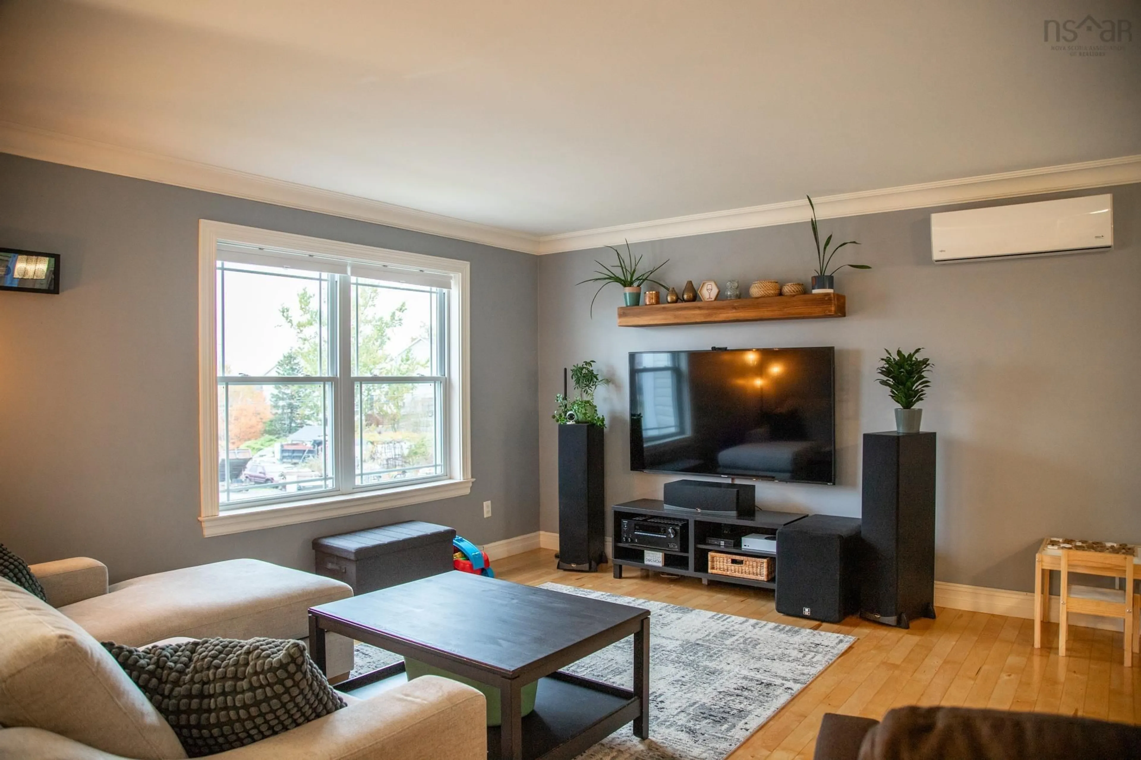 Living room with furniture, wood/laminate floor for 1040 Old Sackville Road Rd, Middle Sackville Nova Scotia B4A 3A6
