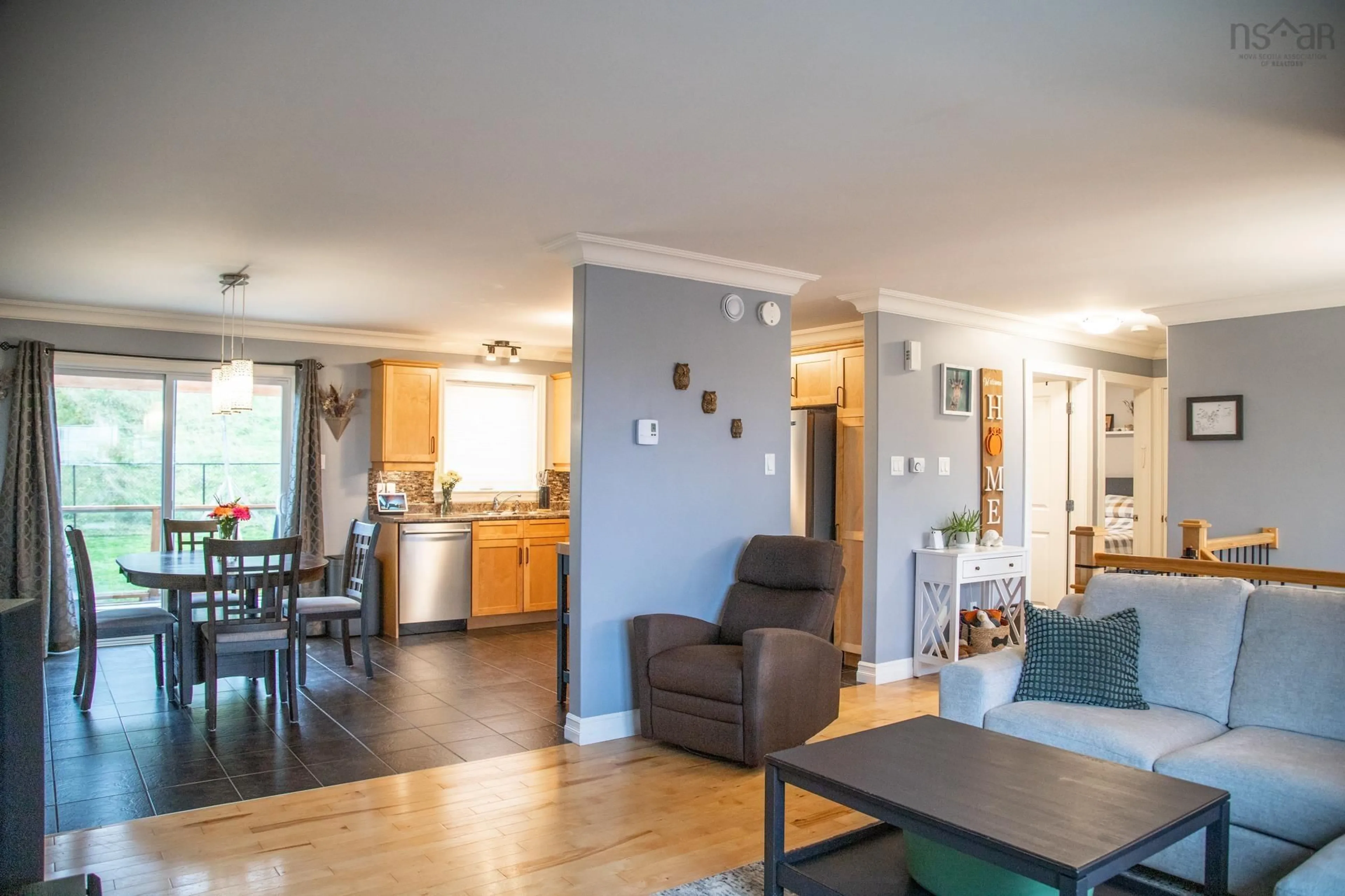 Open concept kitchen, wood/laminate floor for 1040 Old Sackville Road Rd, Middle Sackville Nova Scotia B4A 3A6