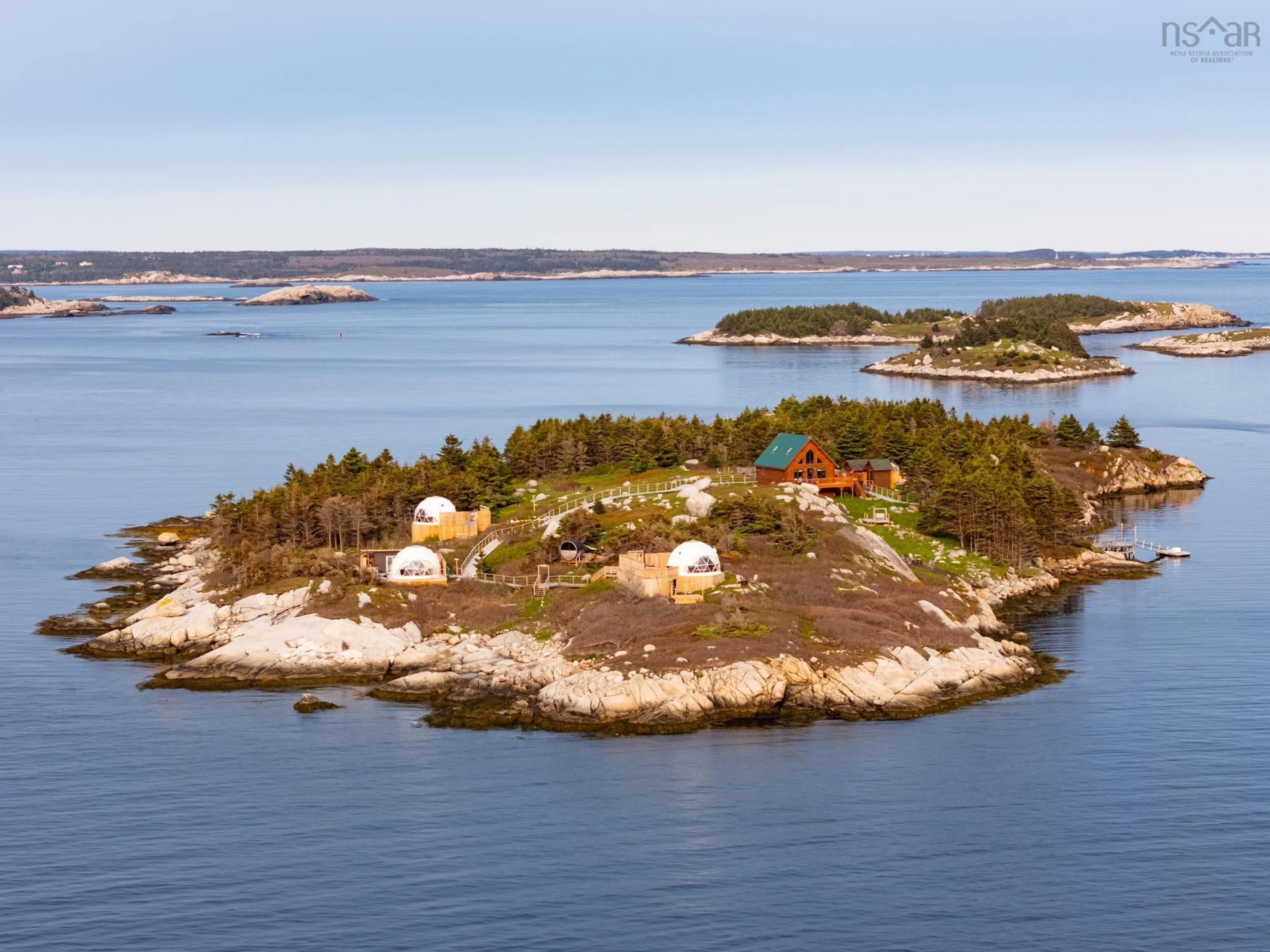 A pic from outside/outdoor area/front of a property/back of a property/a pic from drone, water/lake/river/ocean view for 8 Simmons Island, West Dover Nova Scotia B3Z 3S4