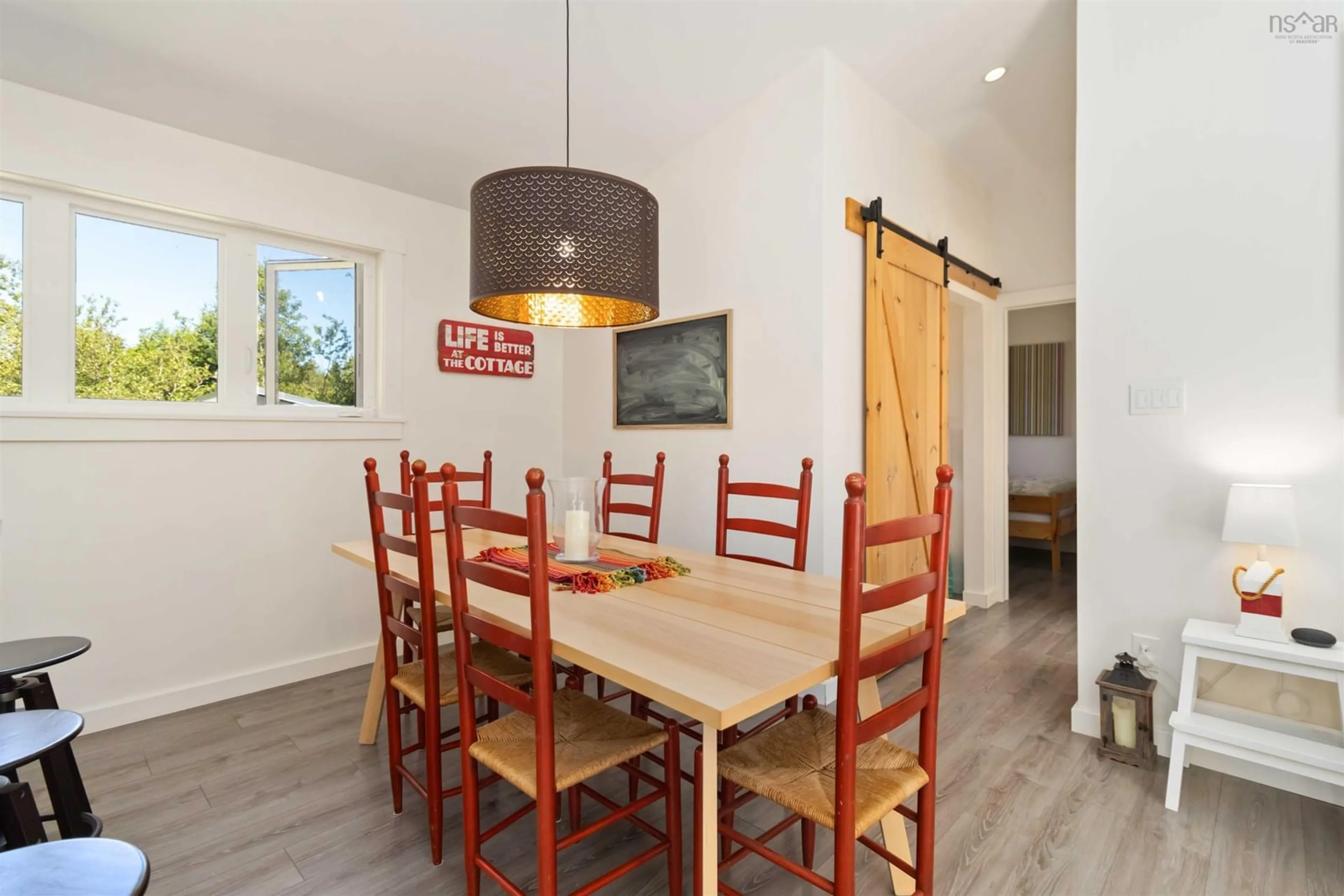 Dining room, wood/laminate floor for 10 Silver Rock Rd, Hunts Point Nova Scotia B0T 1G0