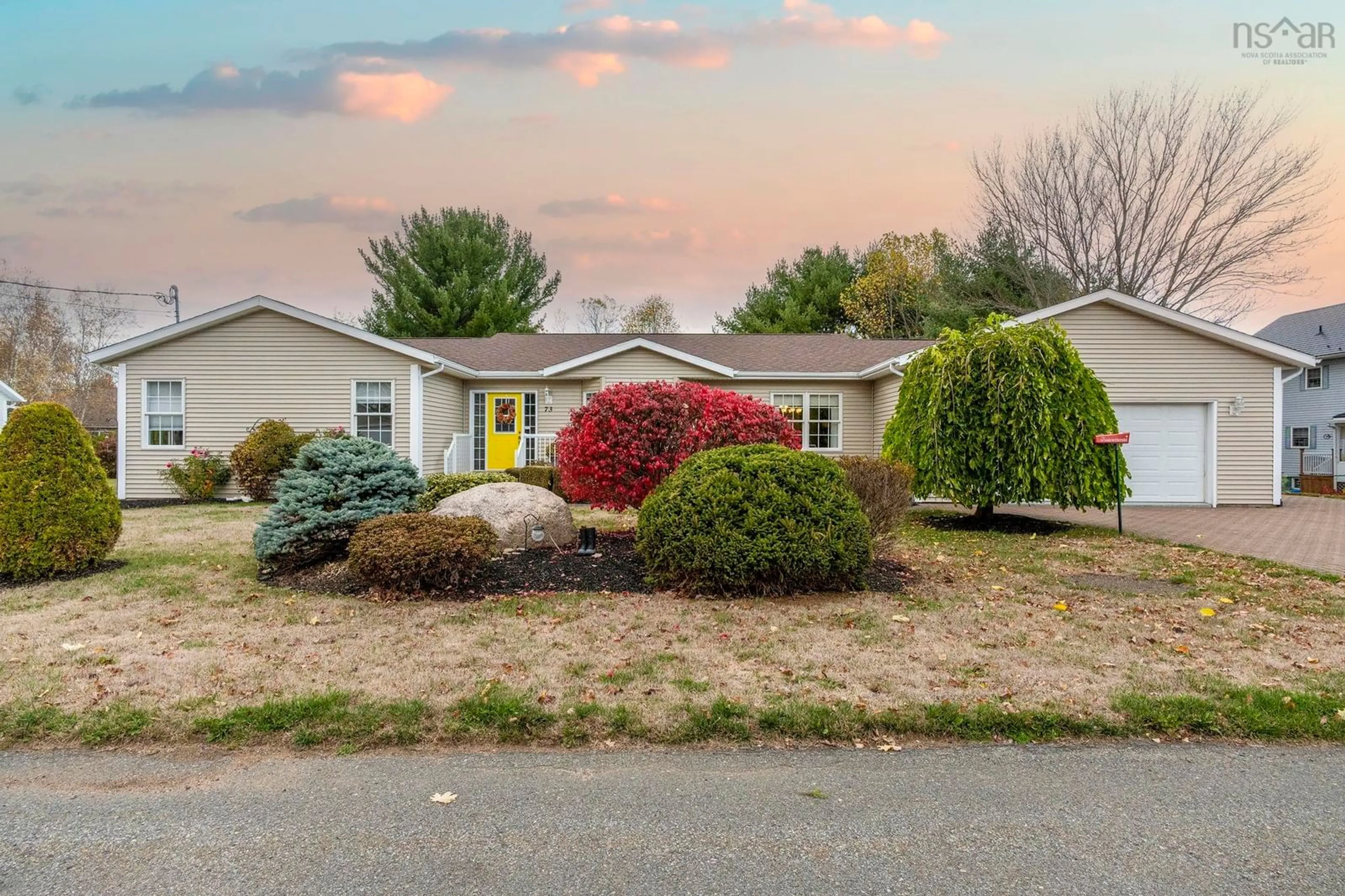Home with vinyl exterior material, street for 73 Gravenstein Dr, Berwick Nova Scotia B0P 1E0