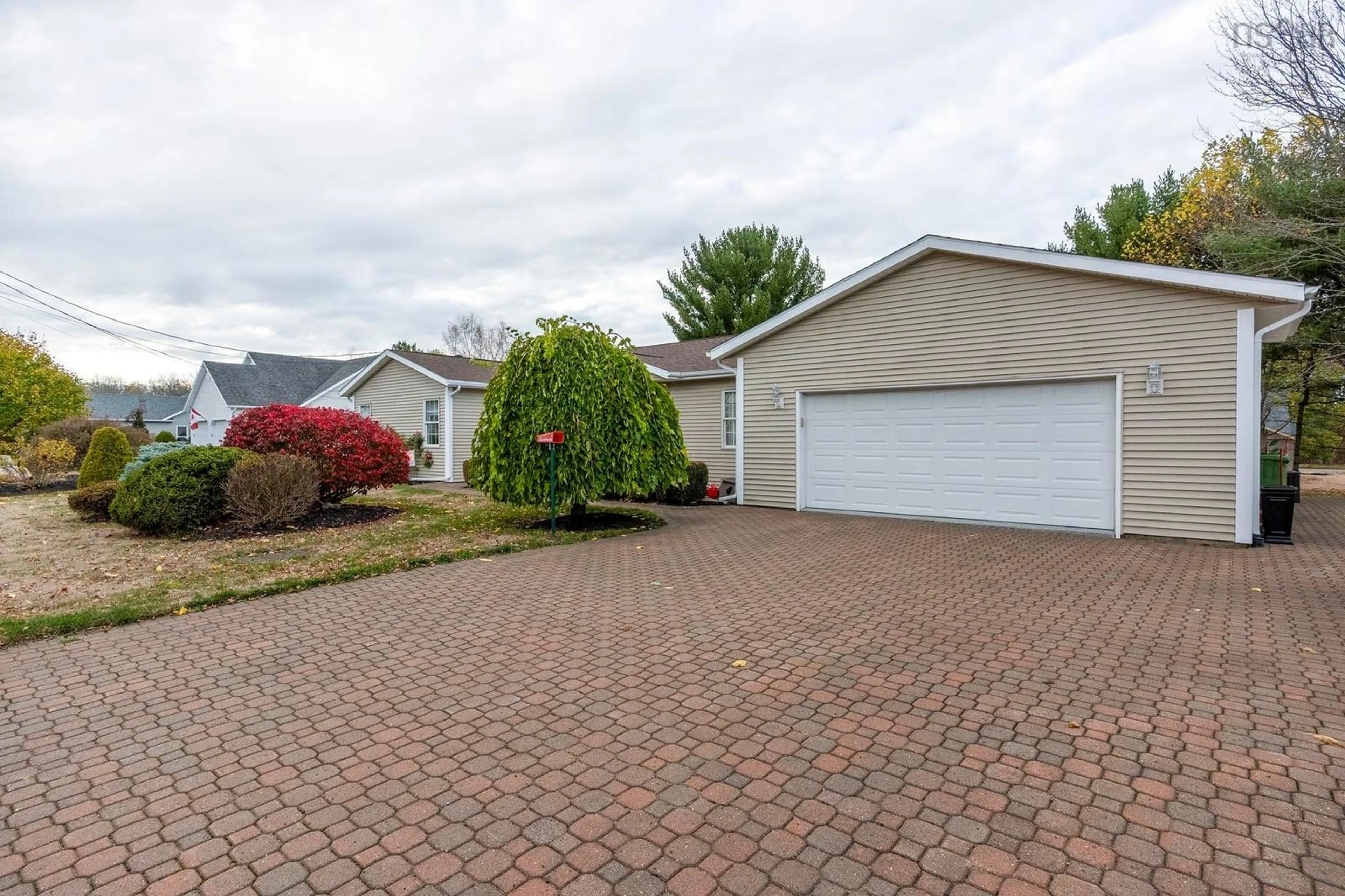 Home with vinyl exterior material, street for 73 Gravenstein Dr, Berwick Nova Scotia B0P 1E0