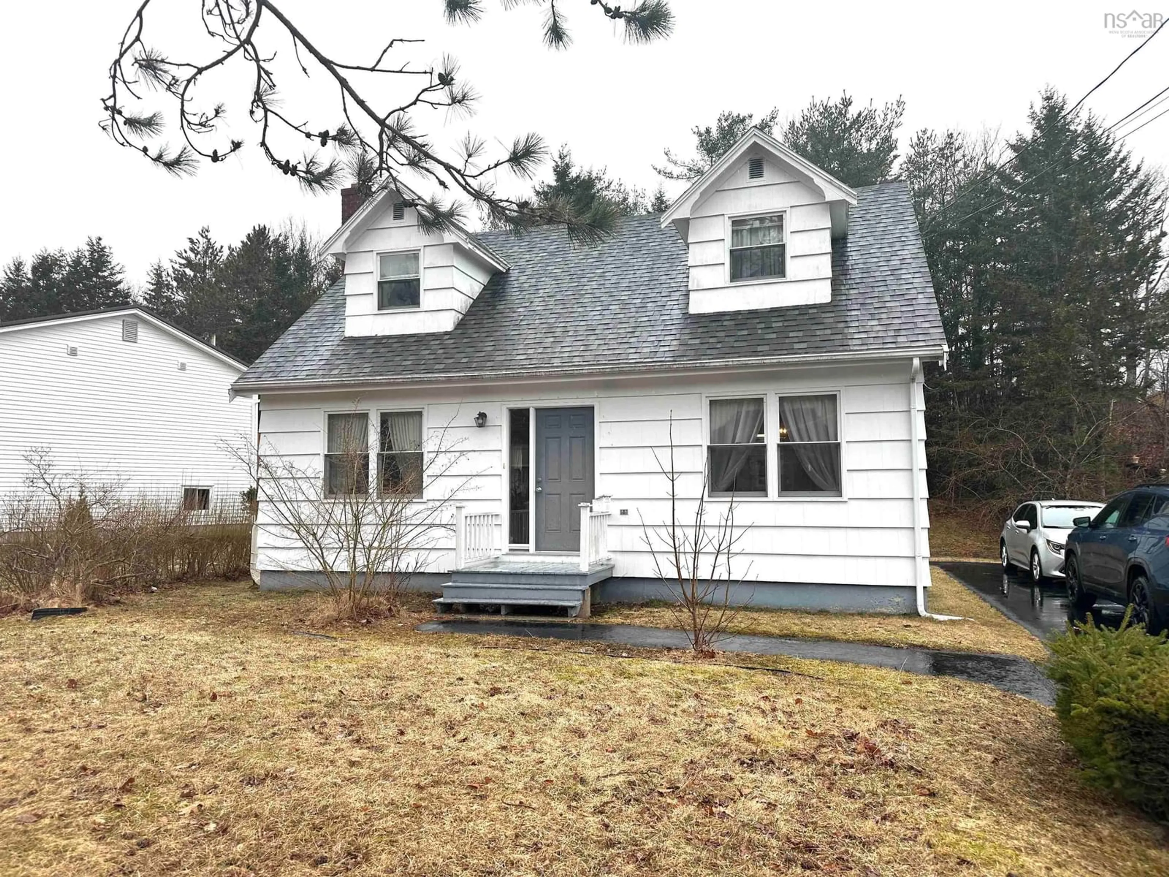 Home with vinyl exterior material, street for 24 Crowell St, Liverpool Nova Scotia B0T 1K0