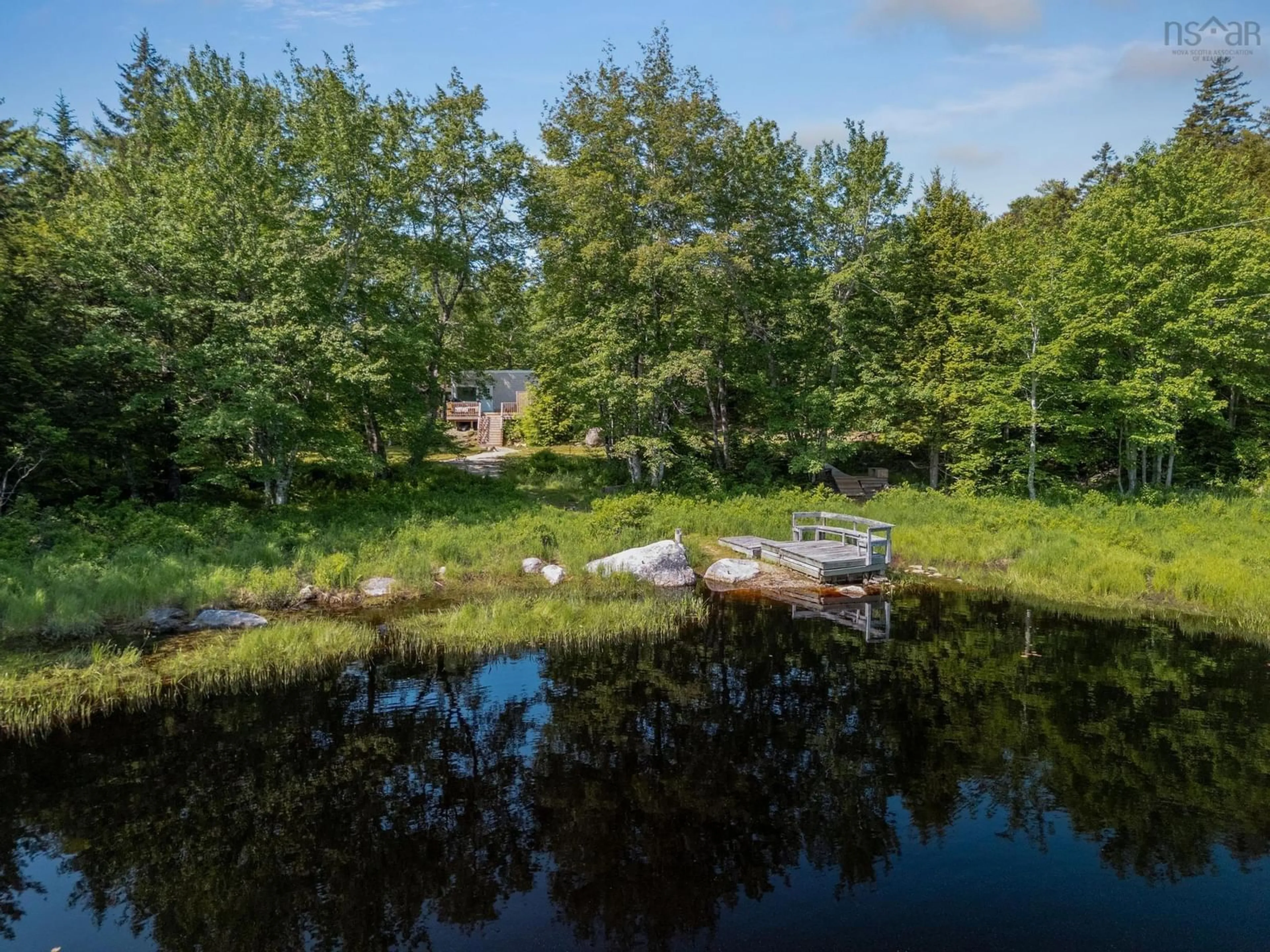 A pic from outside/outdoor area/front of a property/back of a property/a pic from drone, water/lake/river/ocean view for 47 Holters Lane, Chester Grant Nova Scotia B0J 1K0