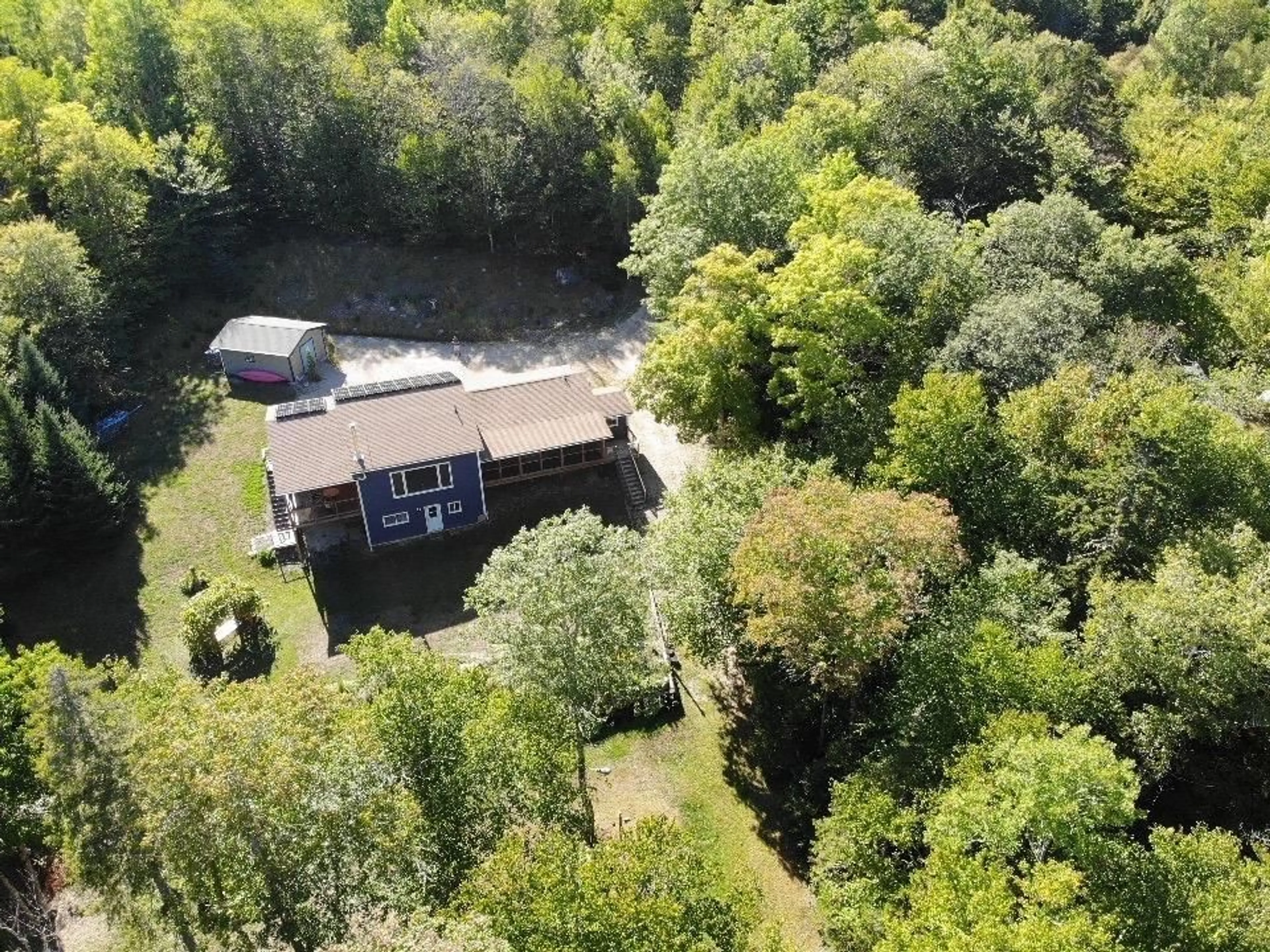 A pic from outside/outdoor area/front of a property/back of a property/a pic from drone, forest/trees view for 590 Gilberts Lane, Maplewood Nova Scotia B0R 1A0
