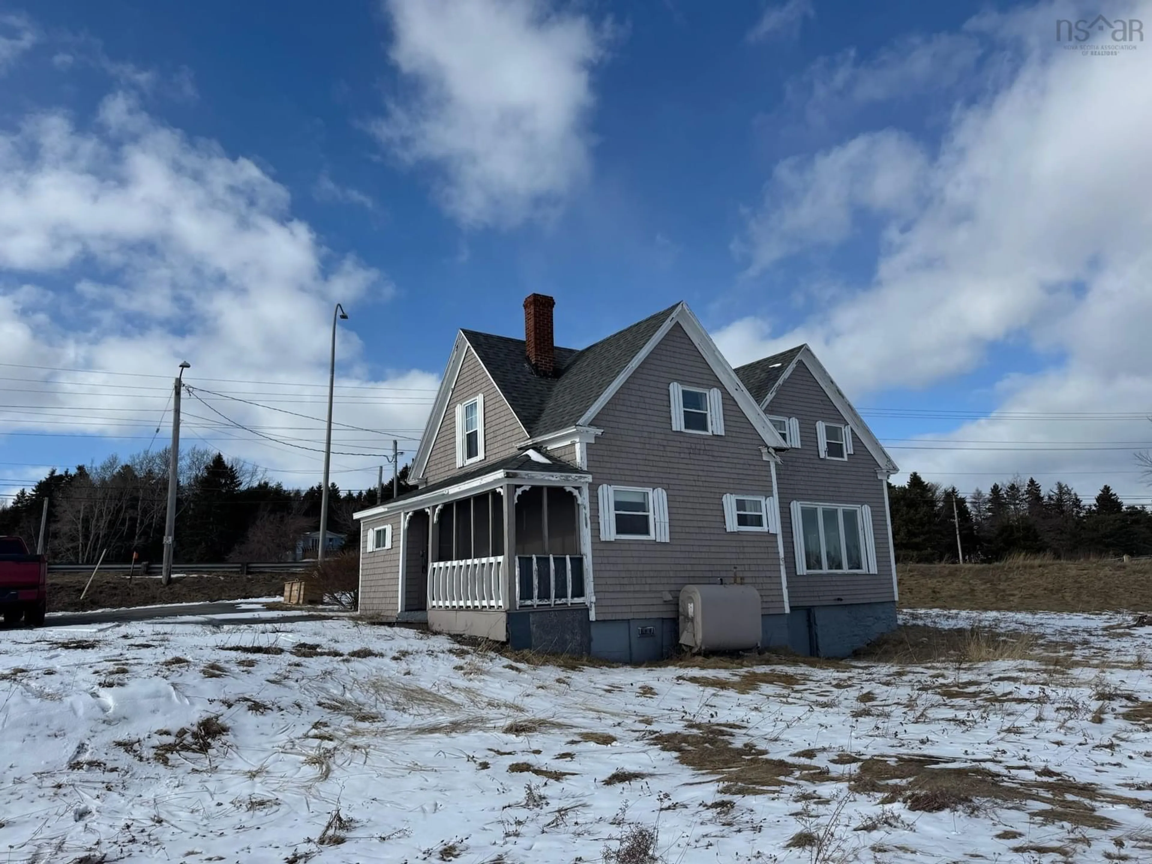 A pic from outside/outdoor area/front of a property/back of a property/a pic from drone, building for 1 Hillside Boularderie Rd, Groves Point Nova Scotia B1Y 2X4