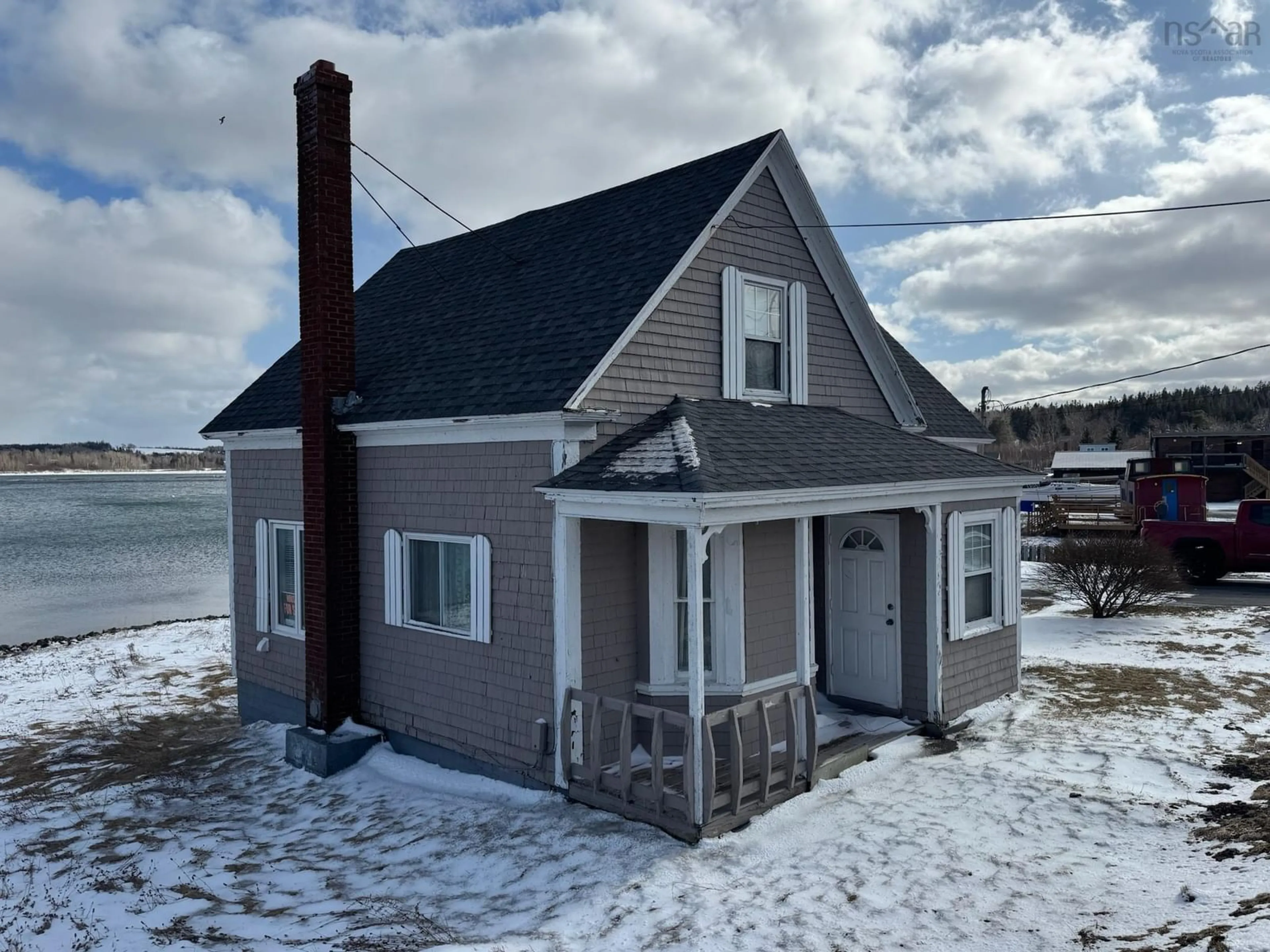 A pic from outside/outdoor area/front of a property/back of a property/a pic from drone, unknown for 1 Hillside Boularderie Rd, Groves Point Nova Scotia B1Y 2X4