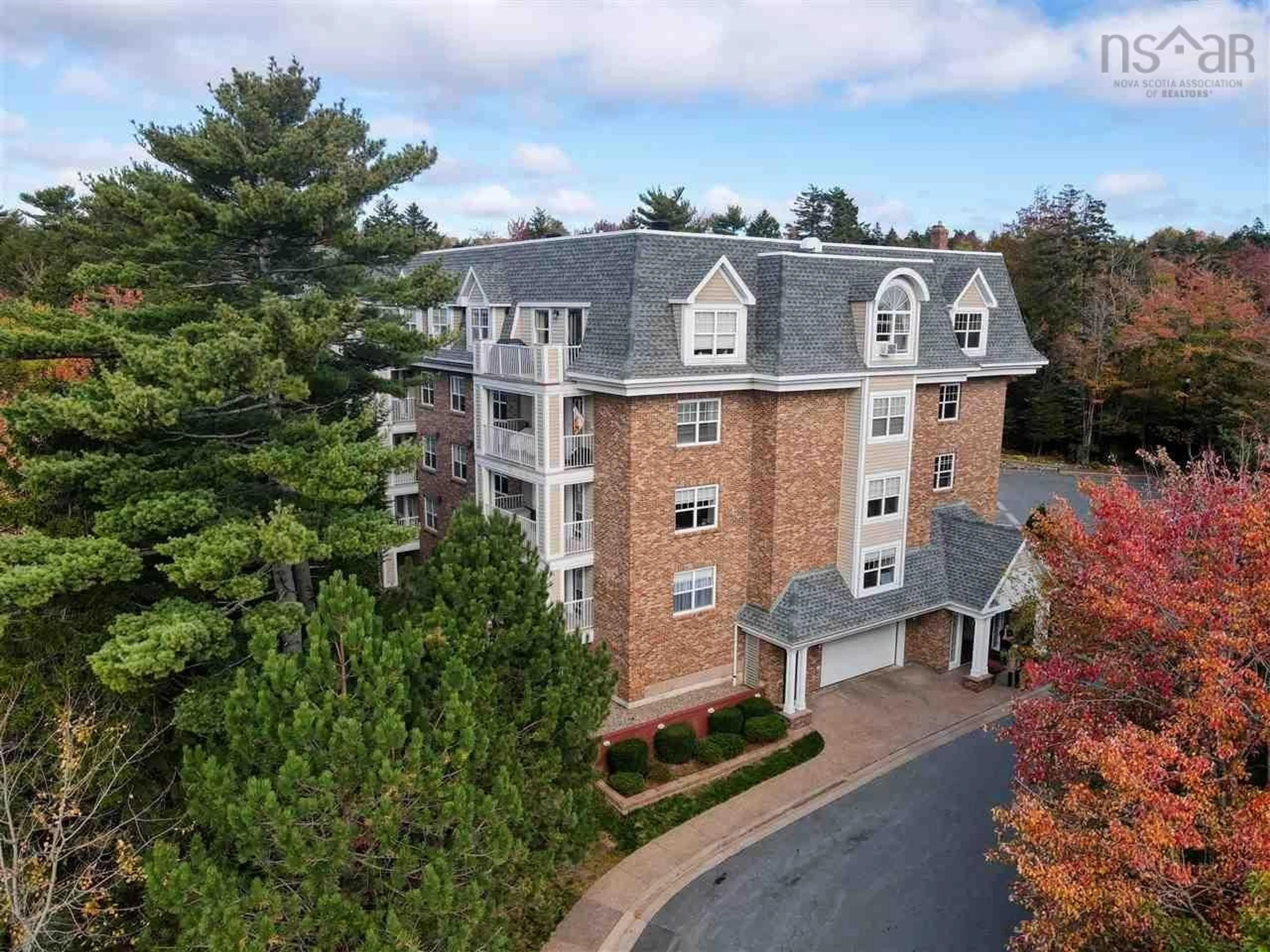 A pic from outside/outdoor area/front of a property/back of a property/a pic from drone, unknown for 211 Hammonds Plains Rd #309, Bedford Nova Scotia B4A 4E1