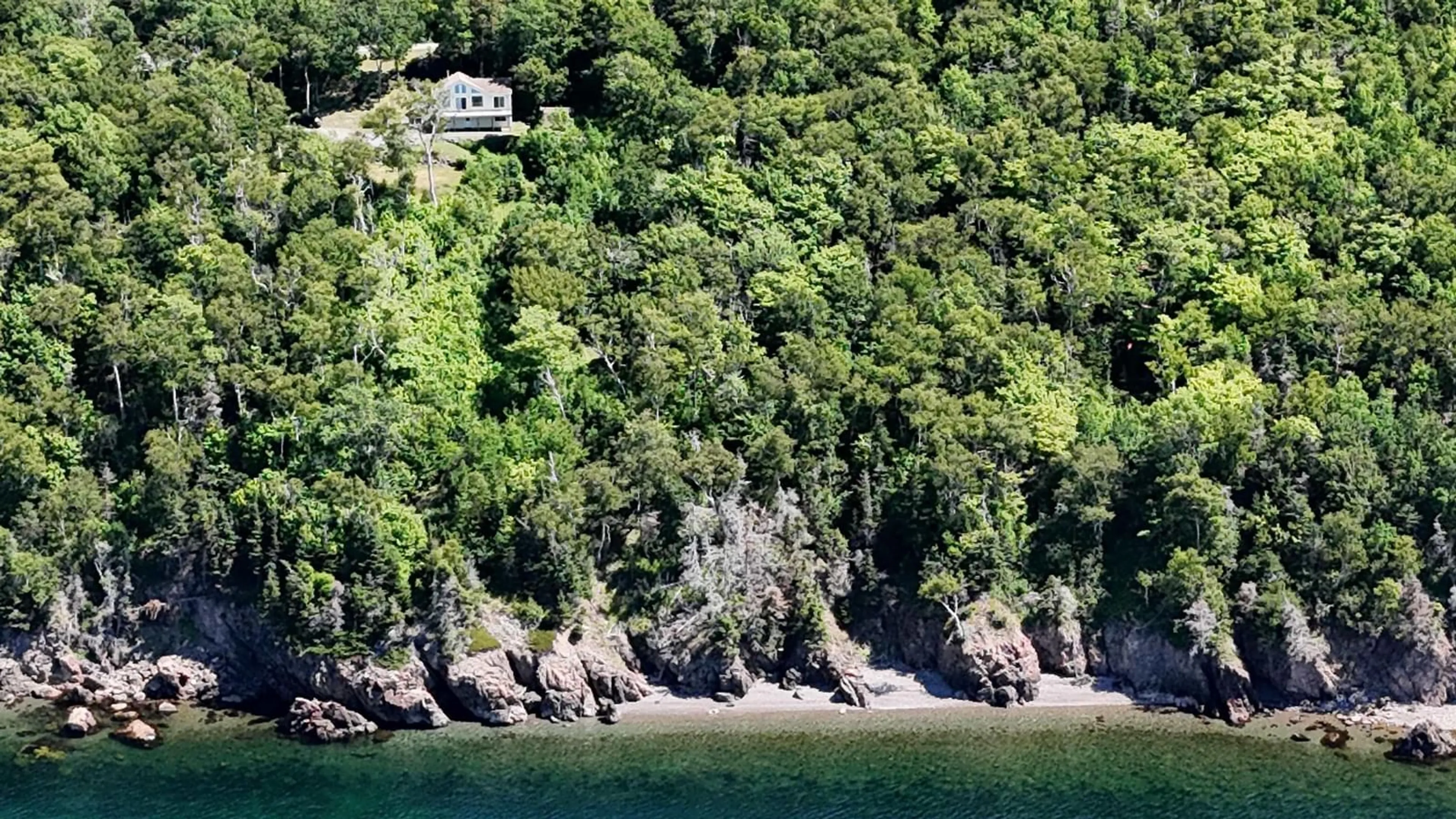 A pic from outside/outdoor area/front of a property/back of a property/a pic from drone, water/lake/river/ocean view for 95 Lakeshore Dr, Irish Cove Nova Scotia B0E 3B0
