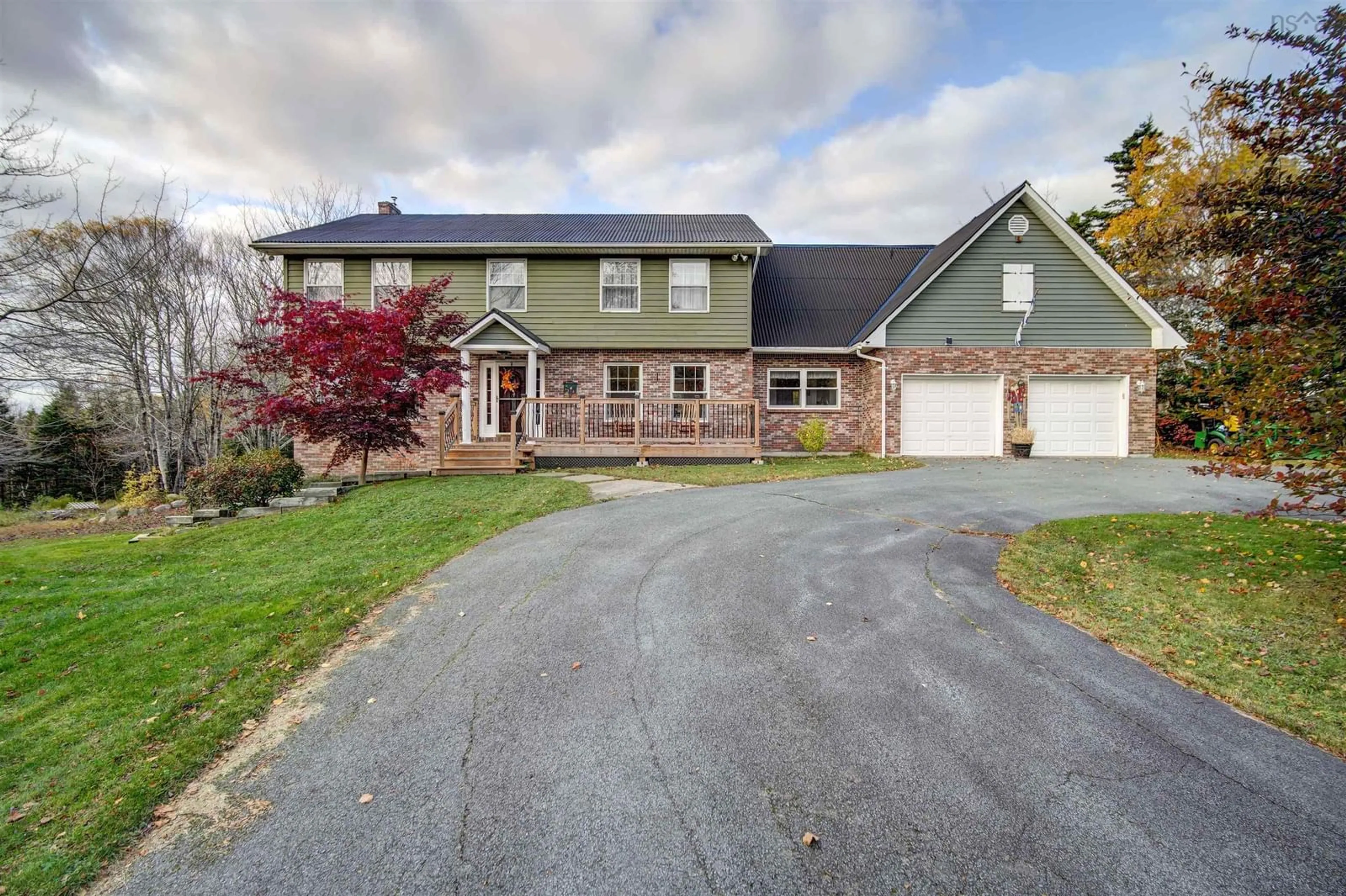 A pic from outside/outdoor area/front of a property/back of a property/a pic from drone, street for 18 Mahar Dr, Shad Bay Nova Scotia B3T 2B6