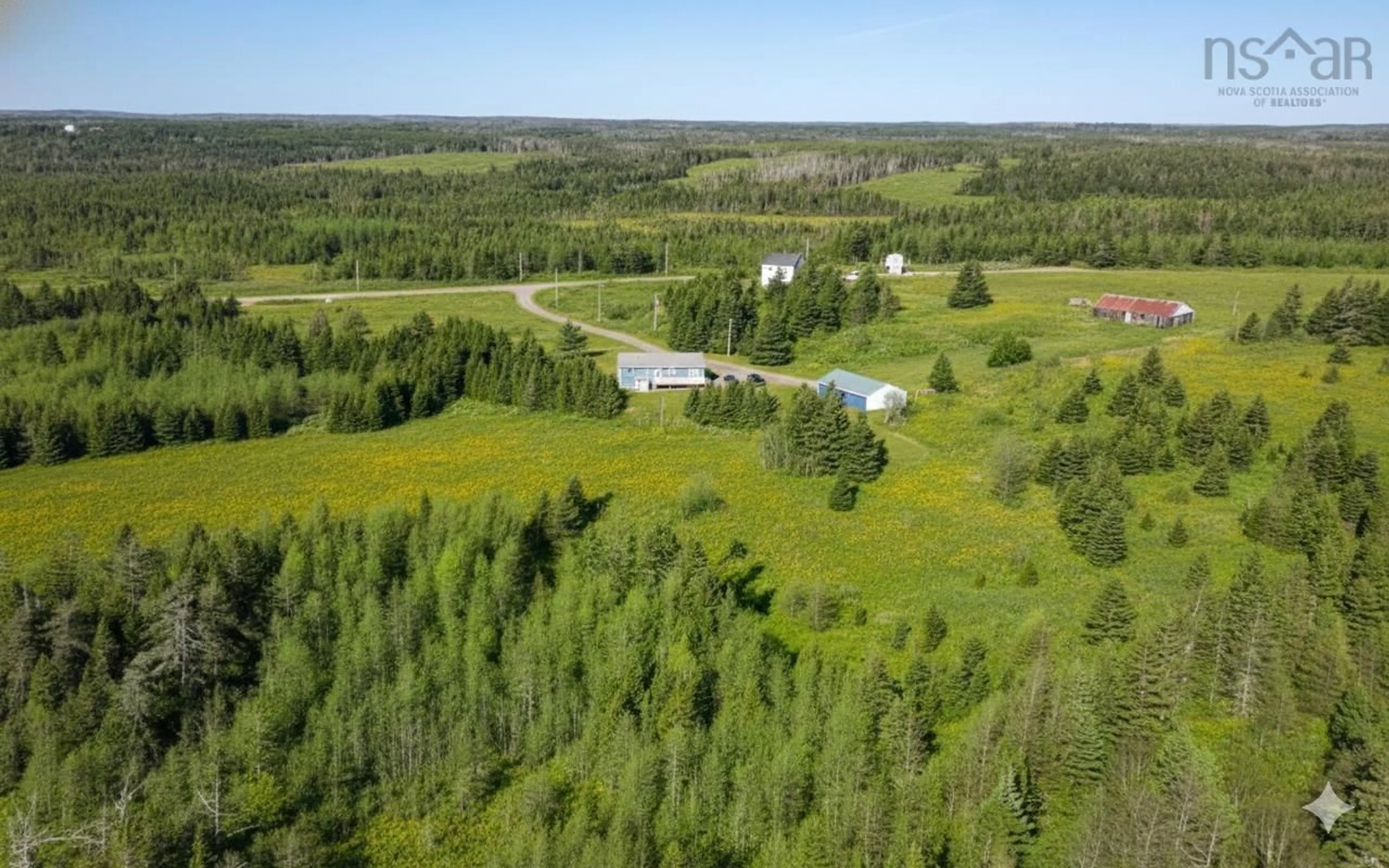 A pic from outside/outdoor area/front of a property/back of a property/a pic from drone, forest/trees view for 6632 St Peters Fourchu Rd, Framboise Intervale Nova Scotia B2J 1E5