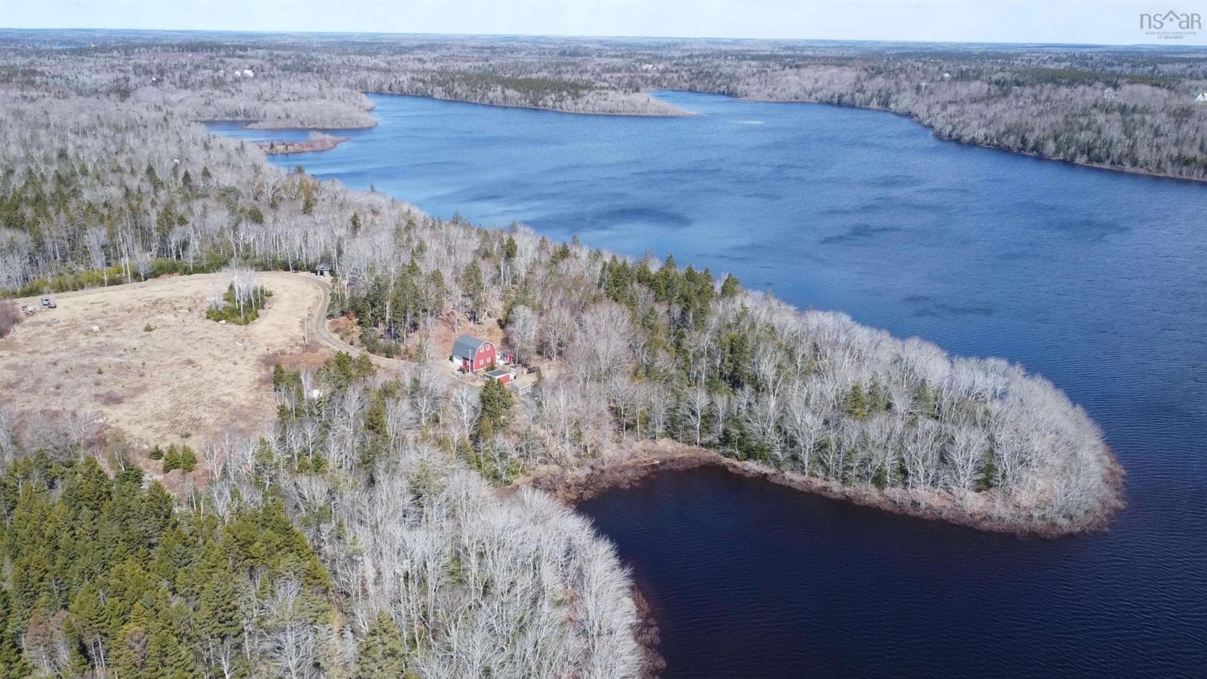 A pic from outside/outdoor area/front of a property/back of a property/a pic from drone, water/lake/river/ocean view for 576 Beaver River Rd, Cedar Lake Nova Scotia B5A 5L9
