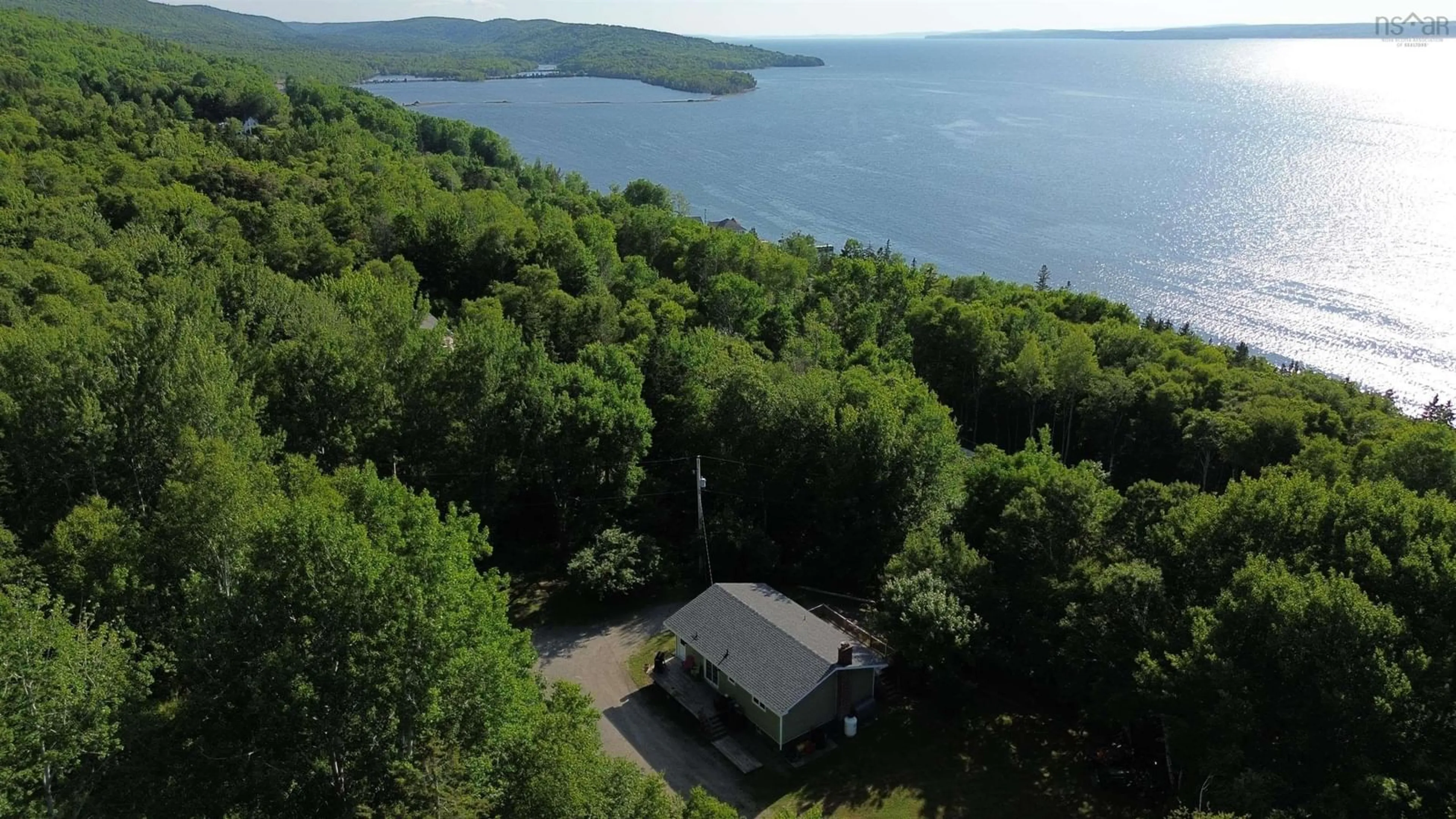 A pic from outside/outdoor area/front of a property/back of a property/a pic from drone, water/lake/river/ocean view for 3381 Long Island Rd, Long Island Nova Scotia B1Y 3N1