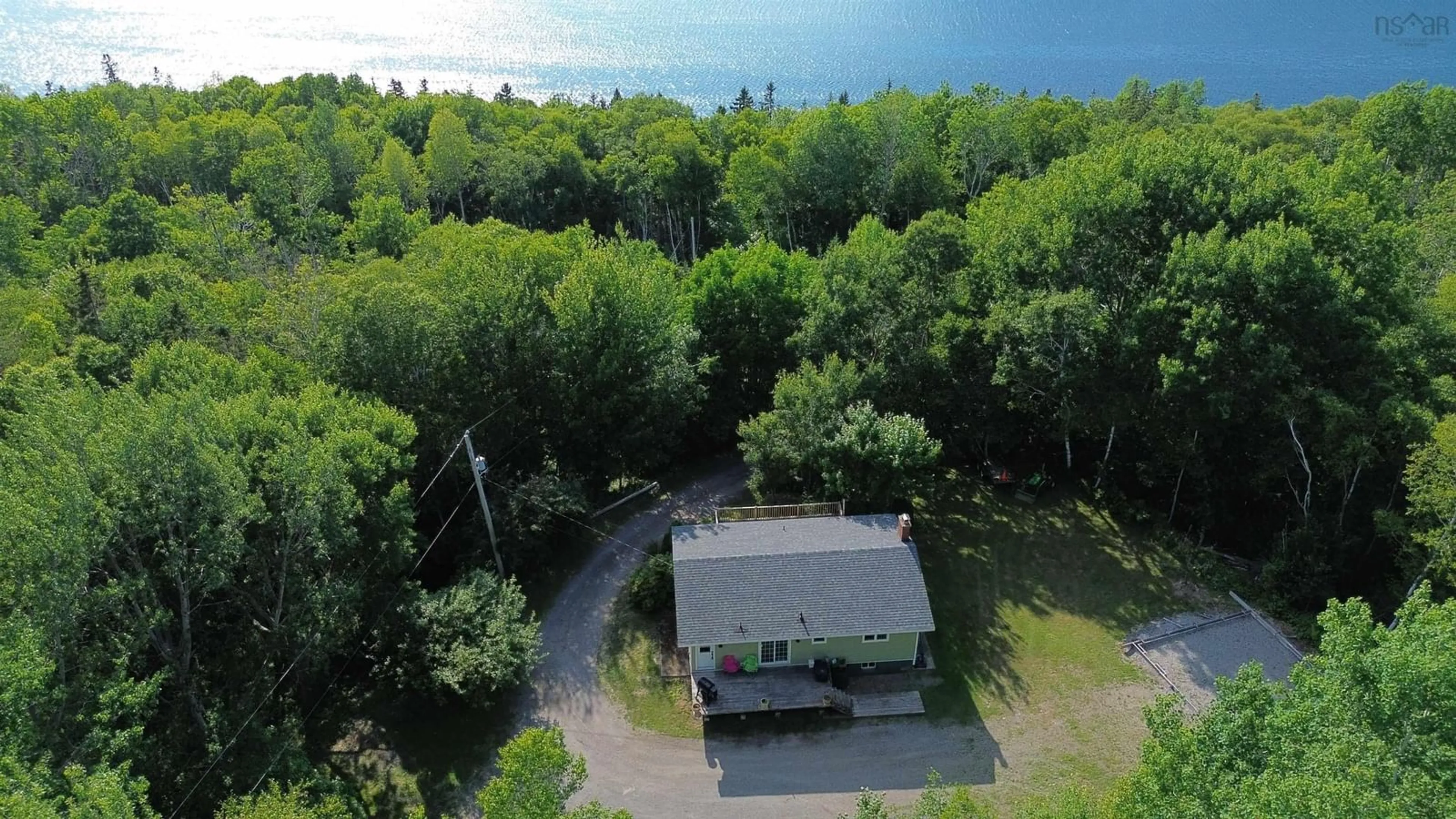 A pic from outside/outdoor area/front of a property/back of a property/a pic from drone, water/lake/river/ocean view for 3381 Long Island Rd, Long Island Nova Scotia B1Y 3N1